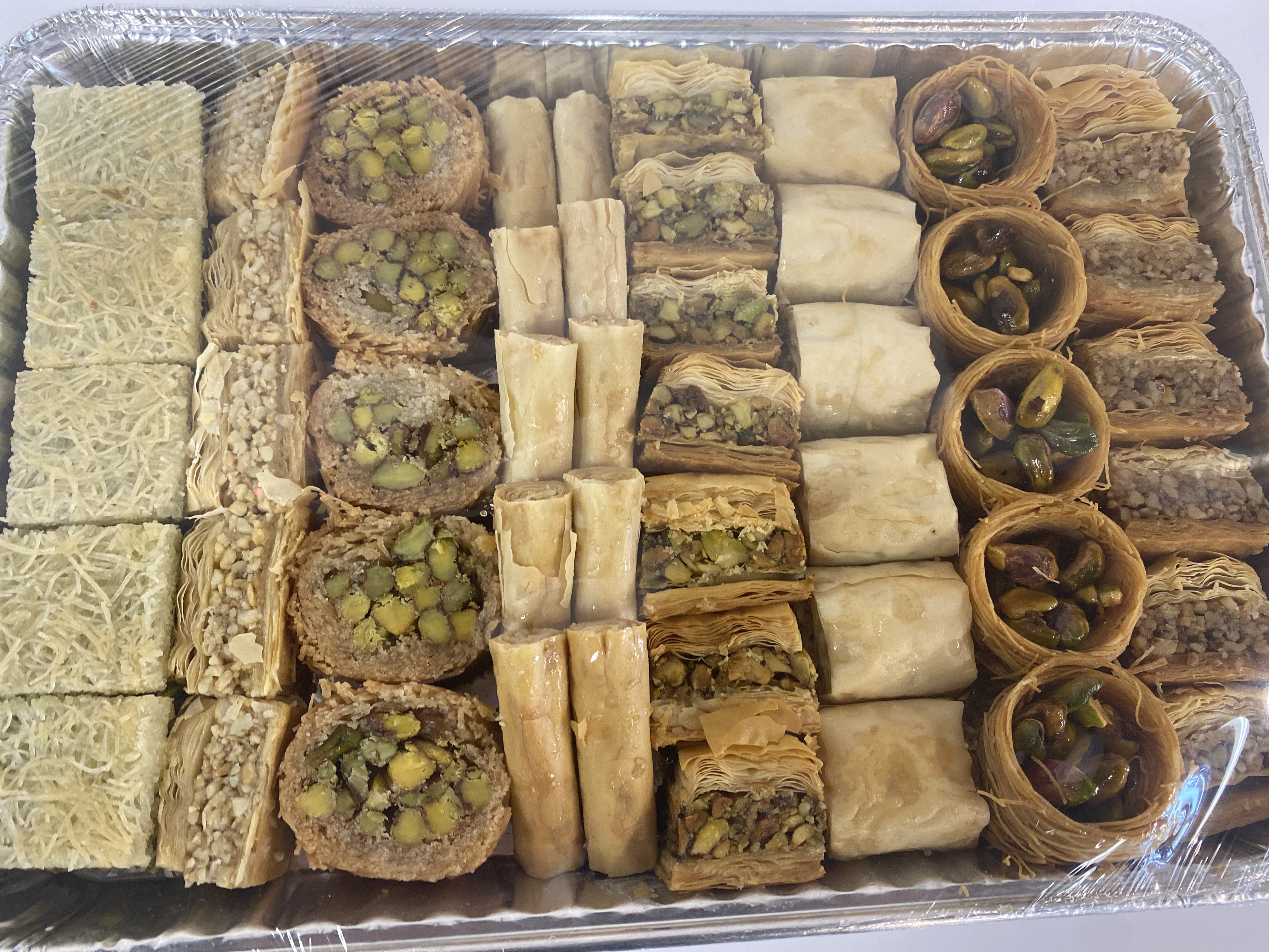 Order Mix Baklava Tray food online from Cravings Dessert Lounge store, Ypsilanti on bringmethat.com
