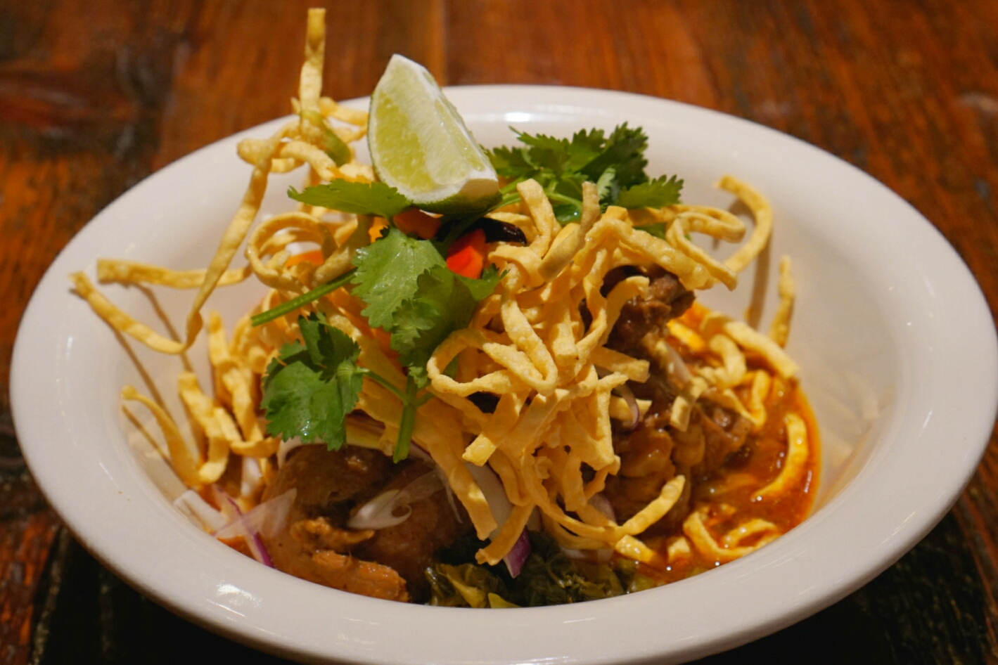 Order Khao Soy (Noodle Curry) food online from Thai Villa store, New York on bringmethat.com