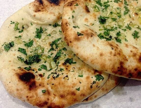 Order Garlic Naan food online from Indiyas store, Egg Harbor on bringmethat.com