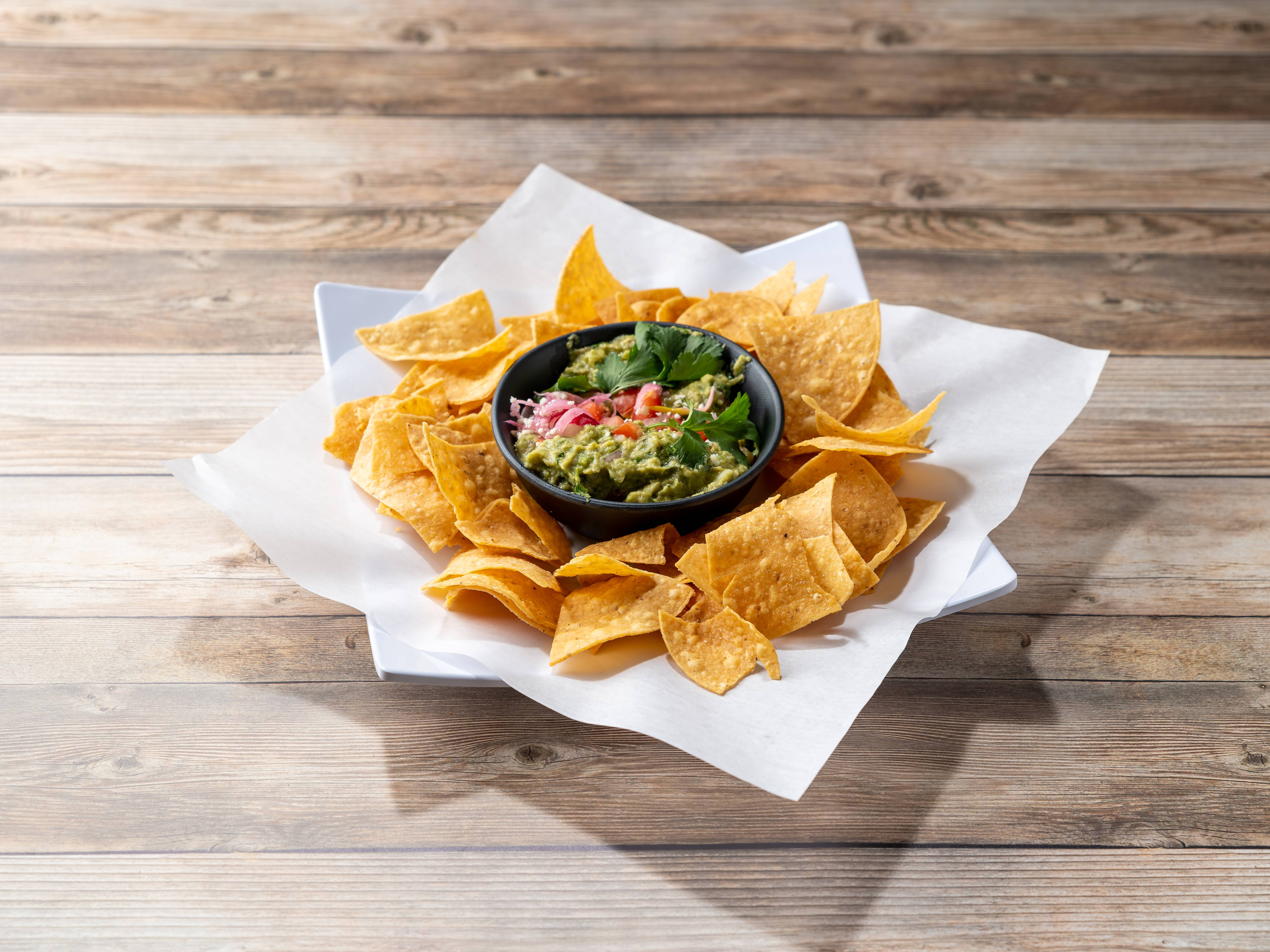 Order Chips and Guacamole food online from Broken English Taco Pub store, Chicago on bringmethat.com