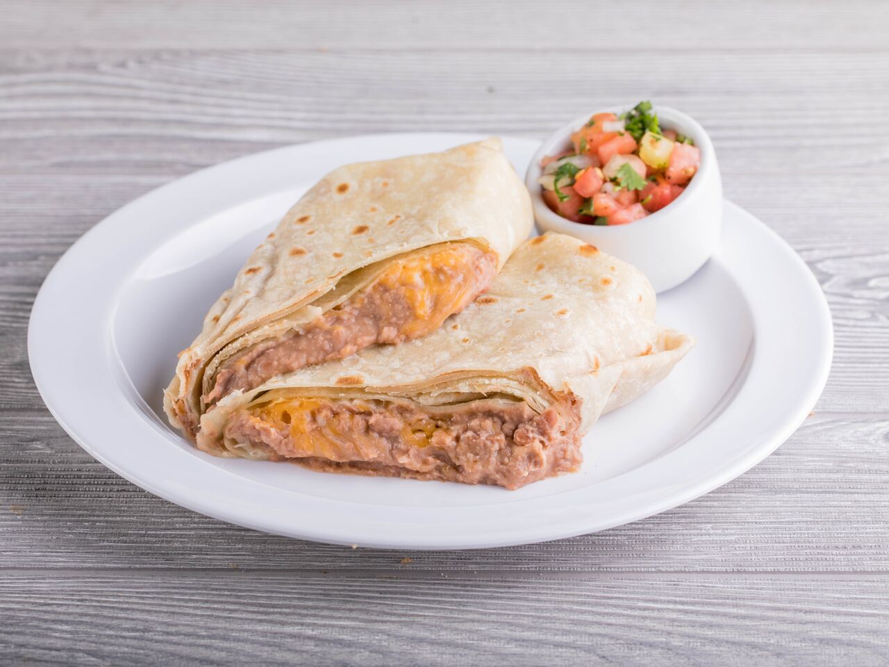 Order Beans with Cheese Burrito food online from Ray Mexican Restaurant store, San Diego on bringmethat.com