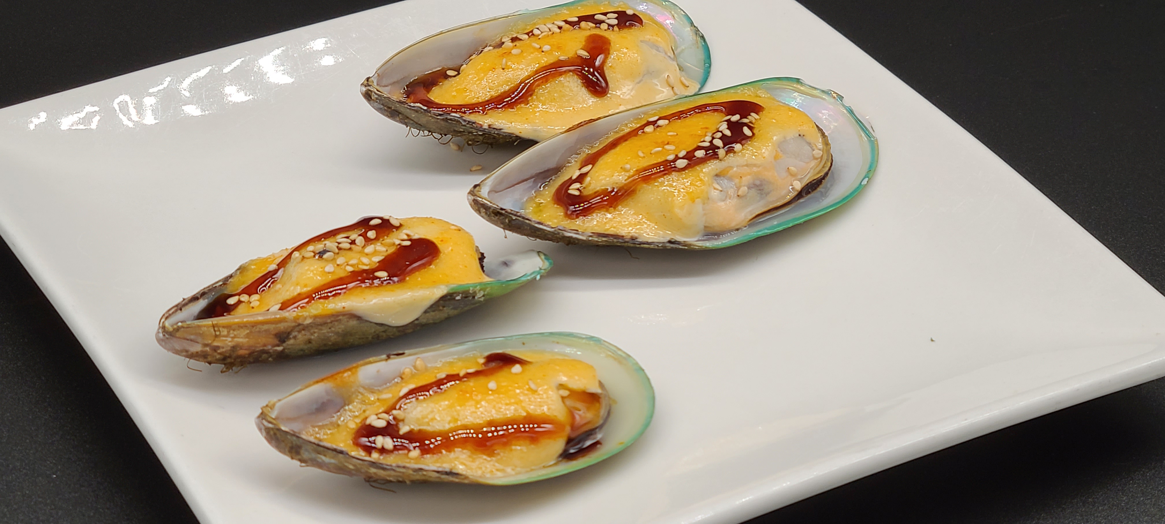 Order A1. Baked Green Mussels(4pcs) food online from Hello Sushi store, Fullerton on bringmethat.com