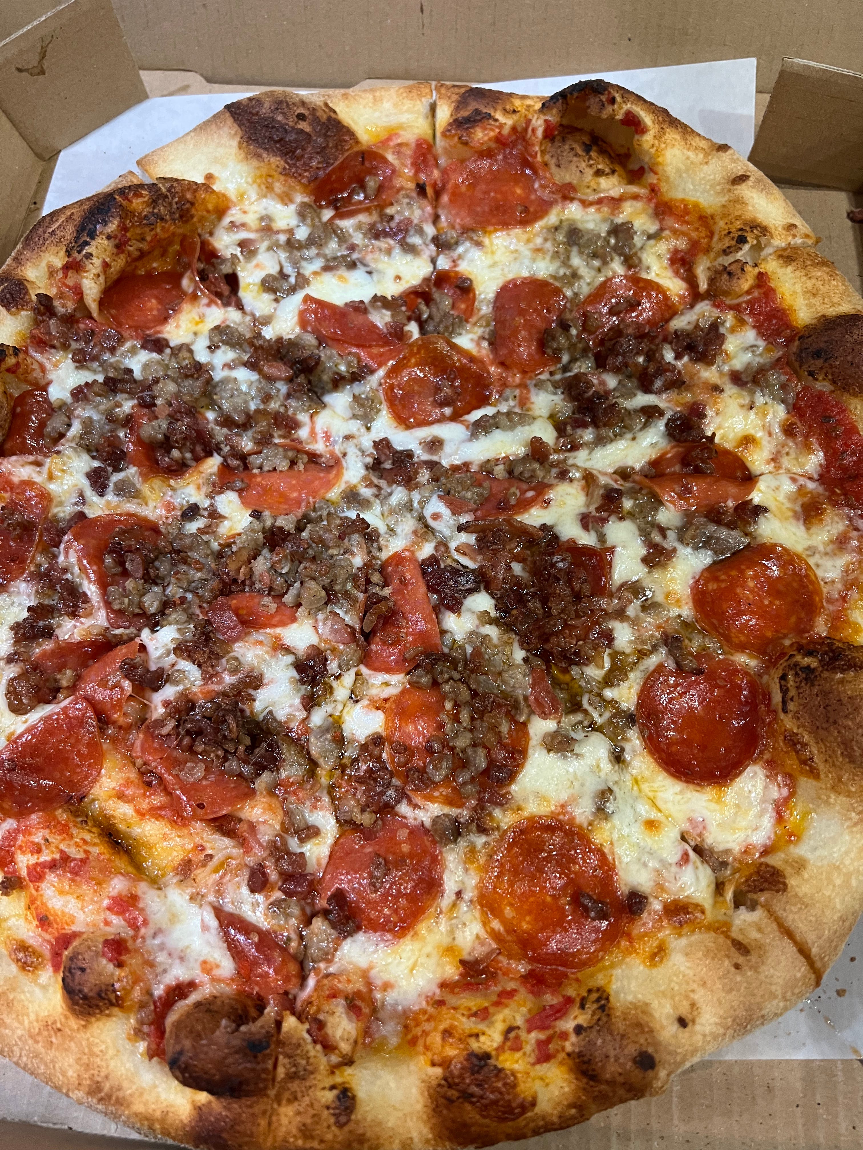 Order Meat Lovers Pizza - Medium 14'' (8 Slices) food online from Evo Brick Oven Pizza store, Philadelphia on bringmethat.com