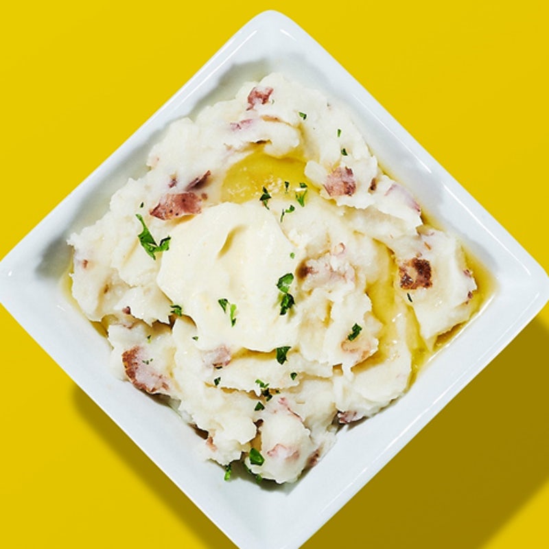 Order Garlic Mashed Potatoes food online from Dave & Buster's store, Arcadia on bringmethat.com