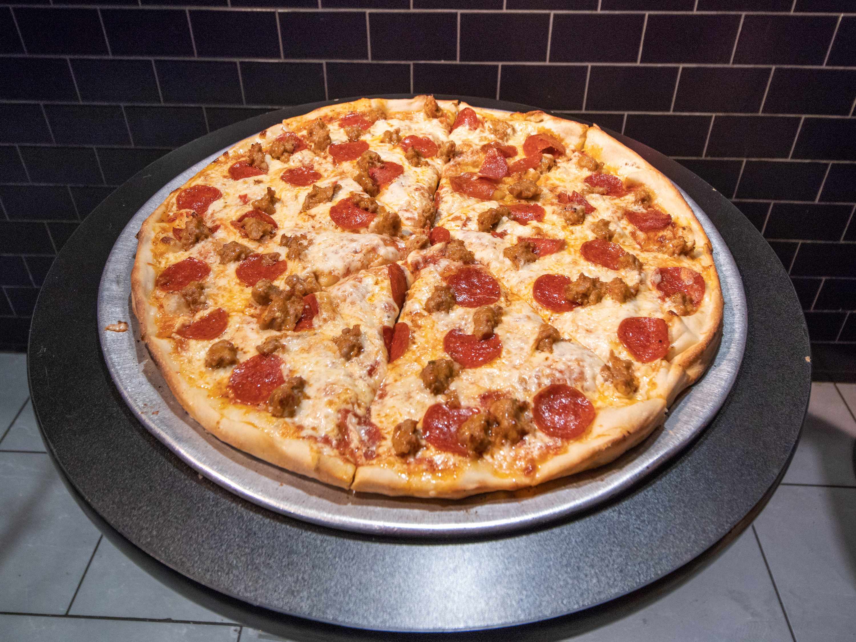 Order Sausage and Pepperoni Pizza Pie food online from 2 Bros Pizza store, New York on bringmethat.com