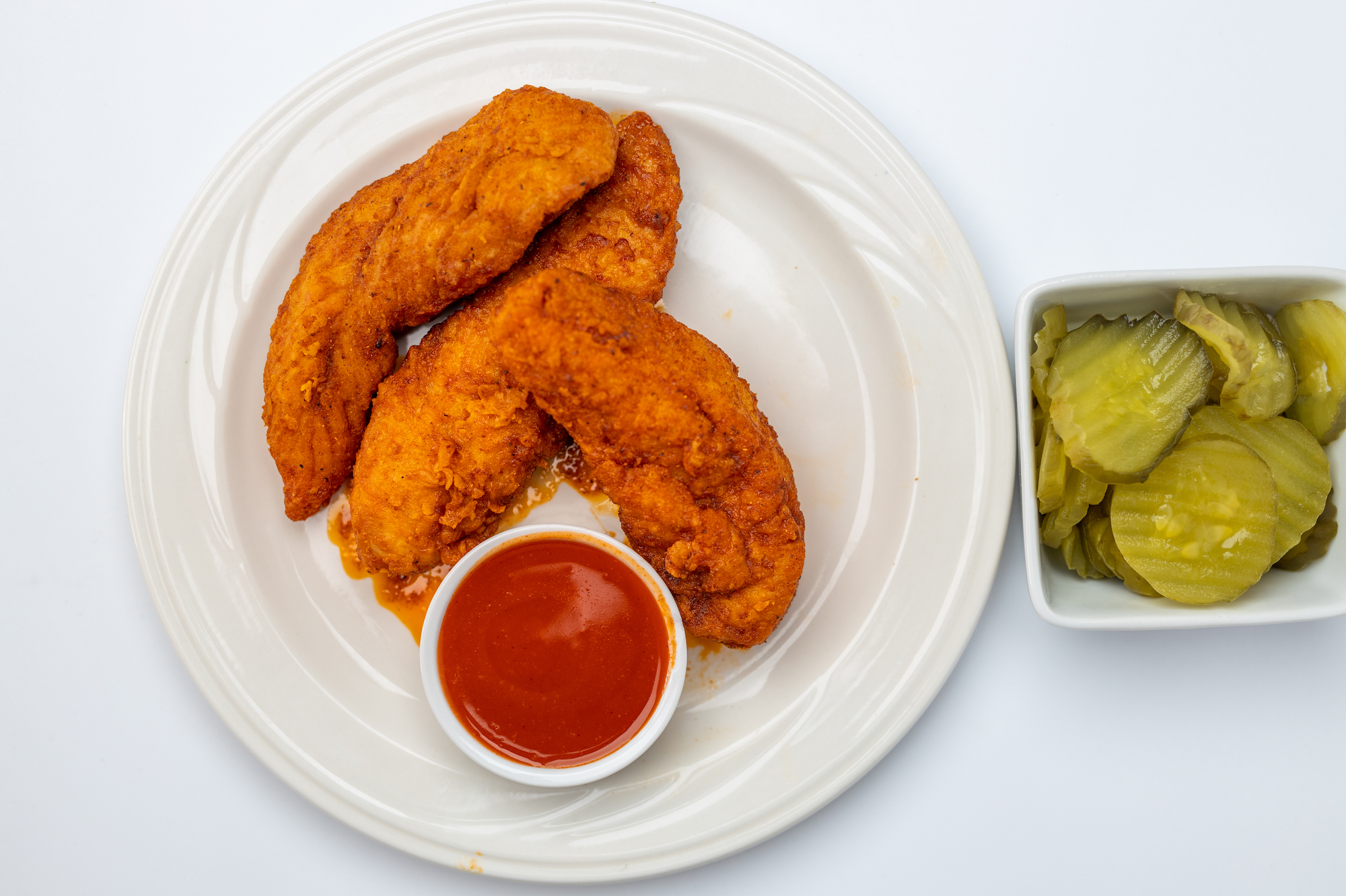 Order 3 Chicken Tenders and 1 Dip (R) food online from Red Nashville Hot Chicken store, Fullerton on bringmethat.com