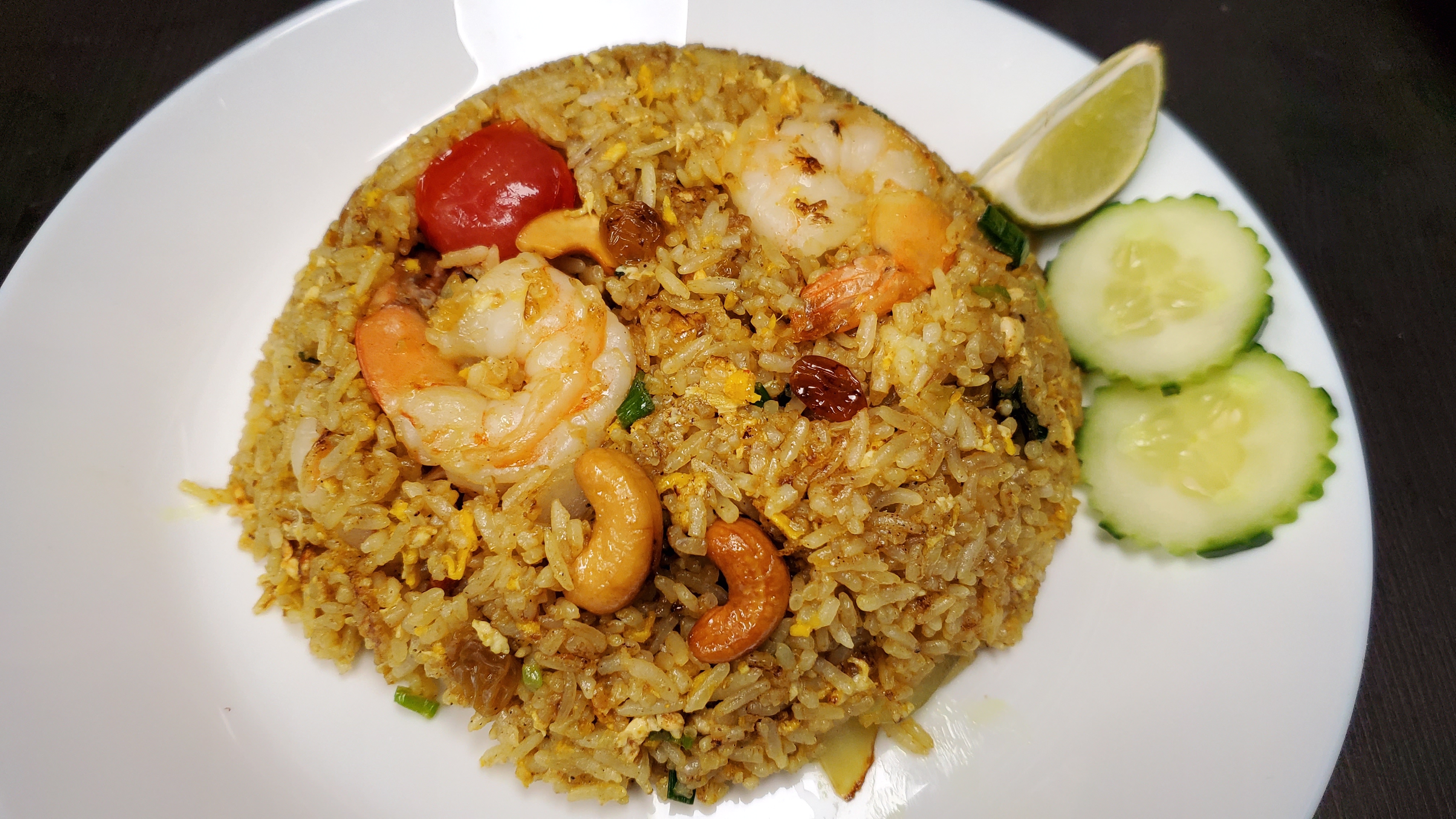 Order Pineapple Fried Rice food online from Thai Paradise store, Severna Park on bringmethat.com