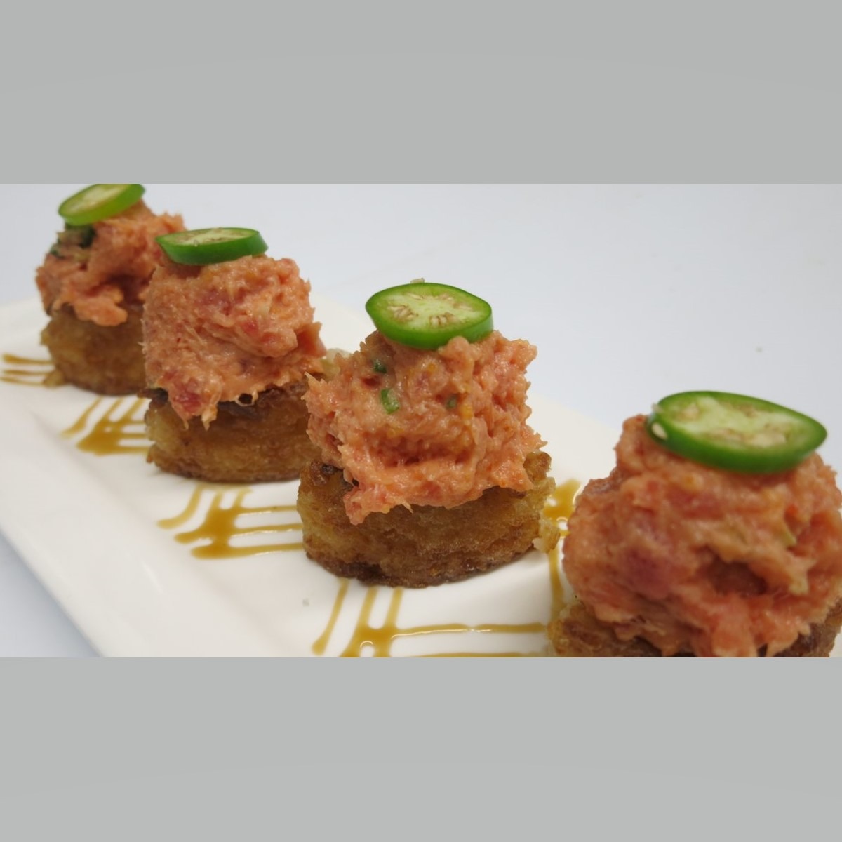 Order Spicy Tuna on Crispy Rice Cake food online from Noshi Sushi store, Los Angeles on bringmethat.com