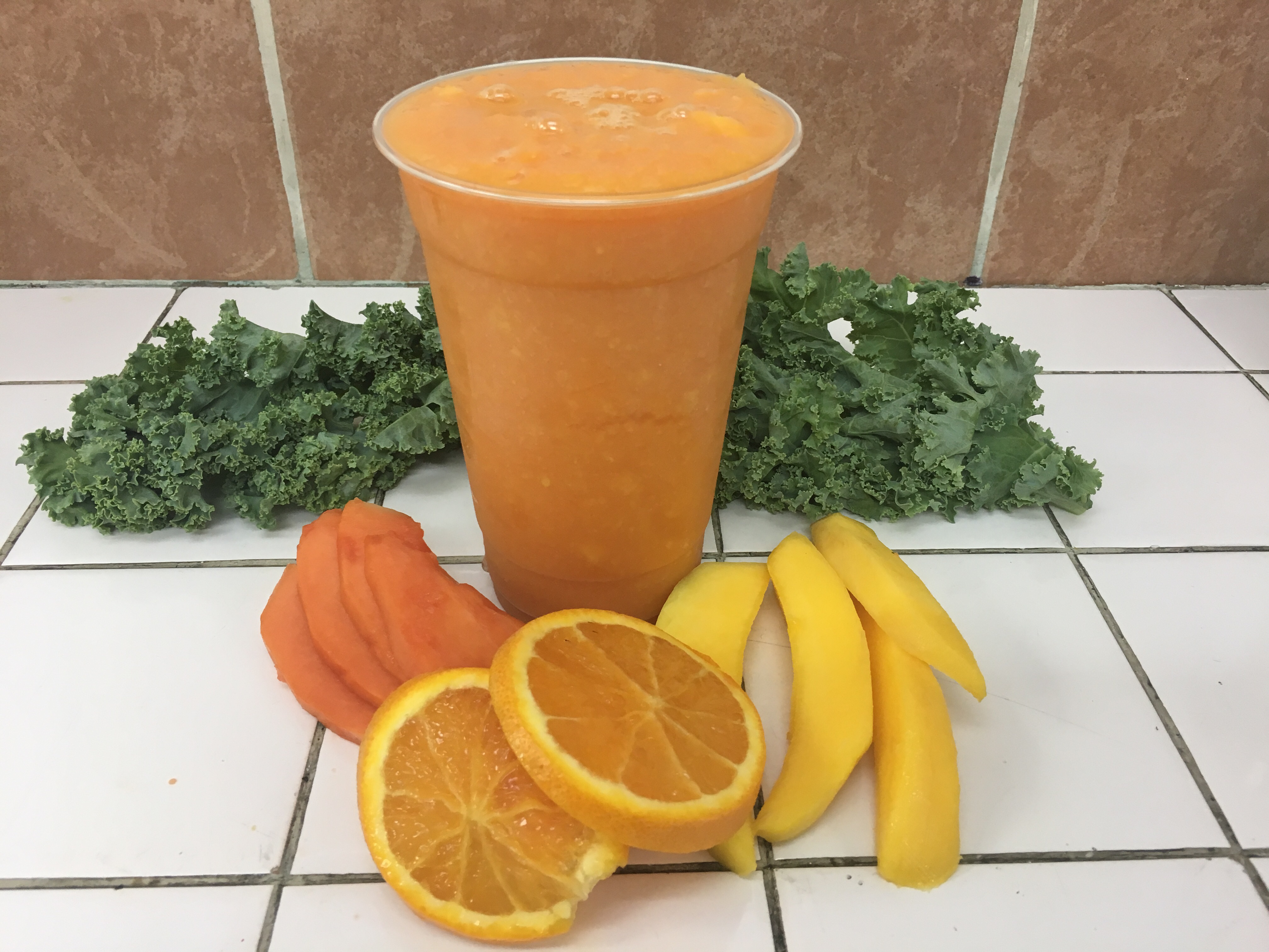 Order 7. Papaya, Orange and Mango Juice food online from Elmhurst Deli store, Elmhurst on bringmethat.com