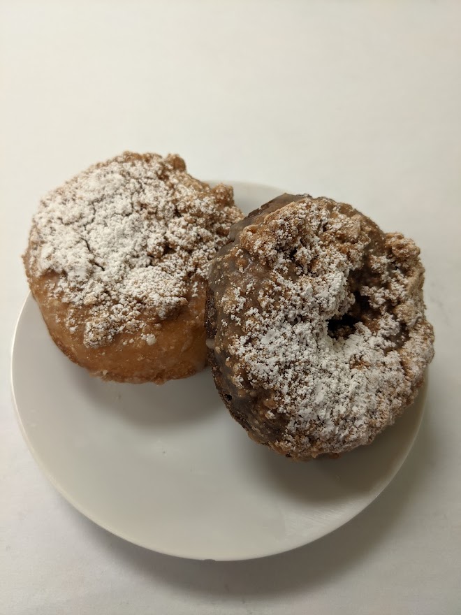 Order Yellow Cake Donut with Cinnamon Crumb Topping food online from Morkes Chocolate store, Huntley on bringmethat.com
