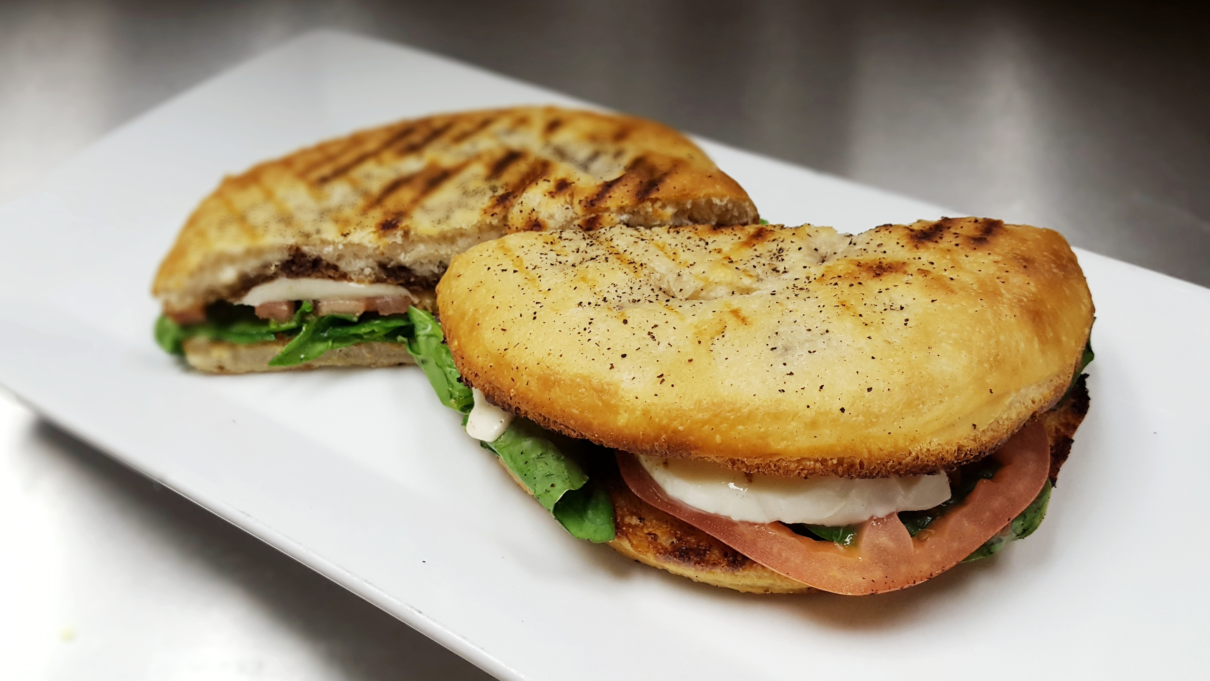 Order Capri Panini food online from Marios Pizza Center & Restaurant store, Middlesex on bringmethat.com