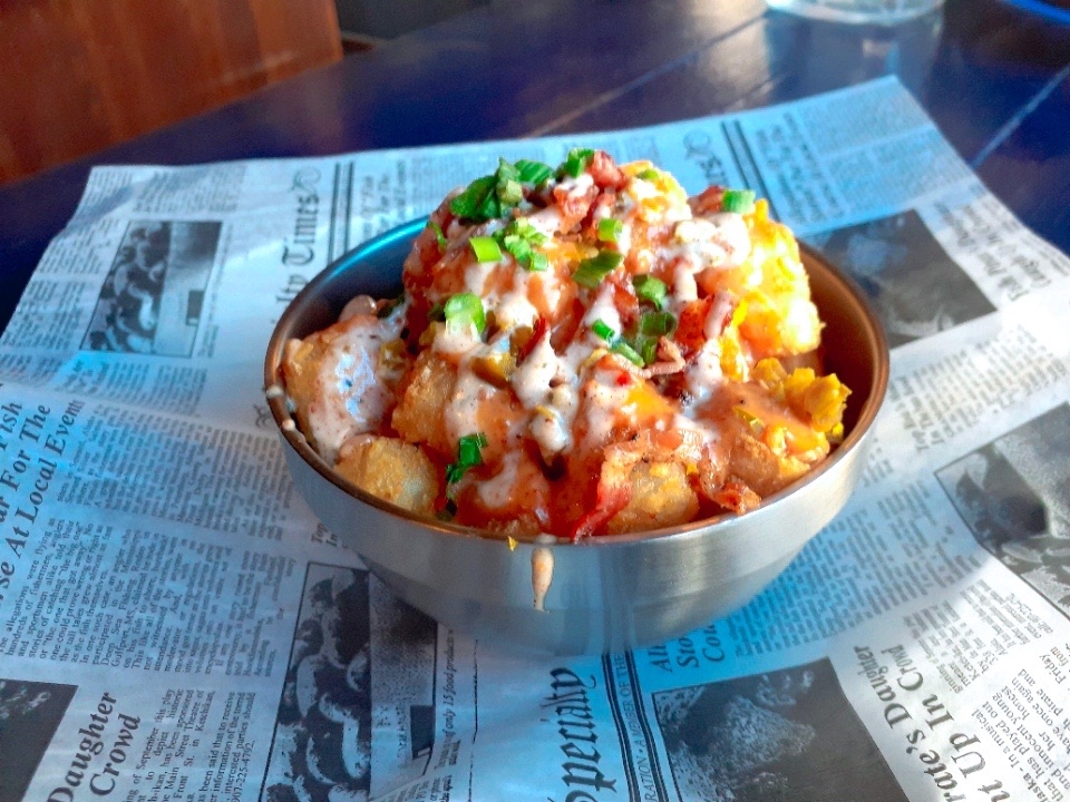 Order Chorizo Queso Tots - NEW food online from Blue Dog Tavern store, Grand Rapids on bringmethat.com