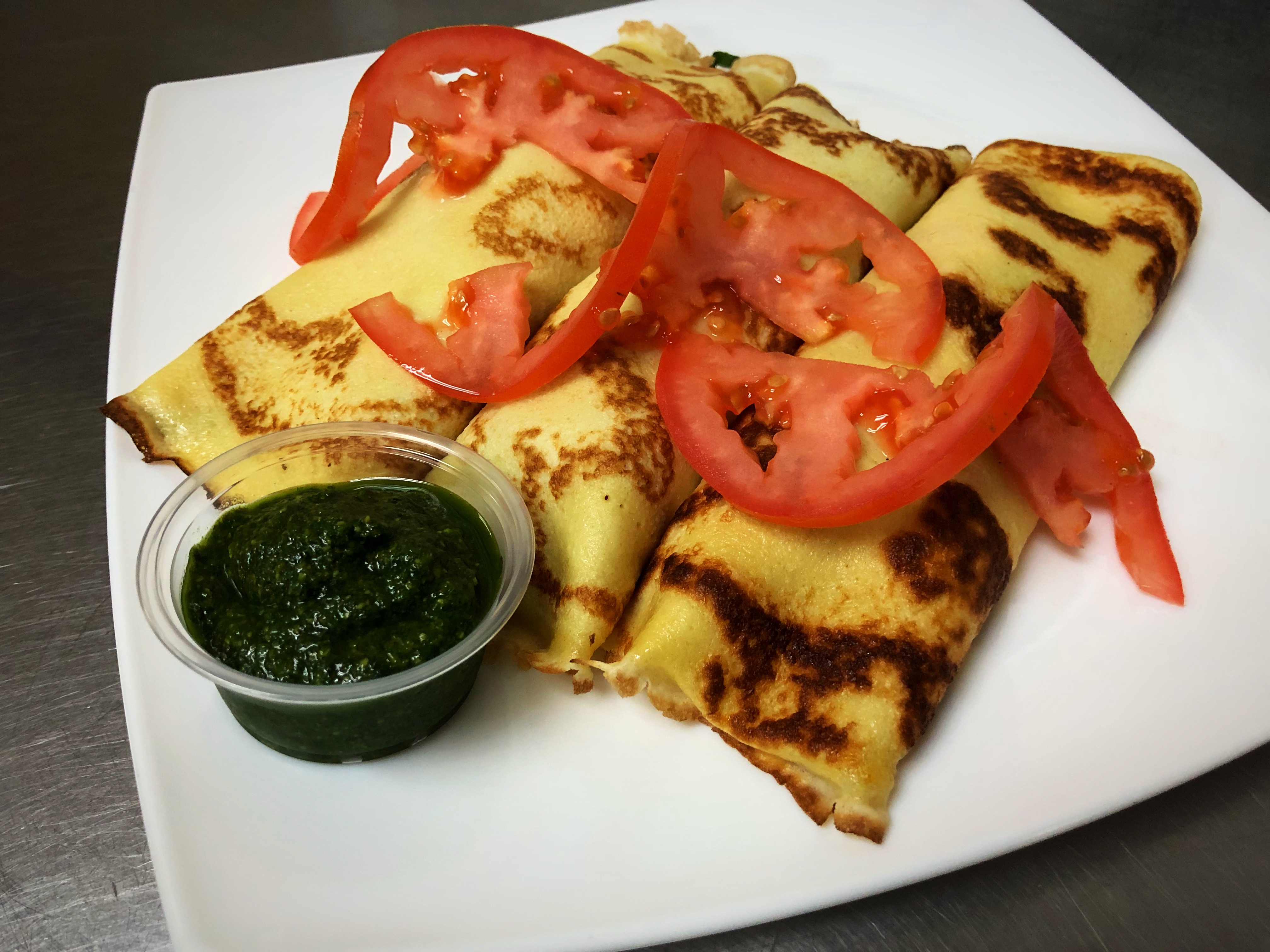 Order Fresh Mozzarella, Tomatoes, Fresh Basil and Pesto Crepes food online from Healthy Garden & Gourmet Pizza store, Moorestown on bringmethat.com