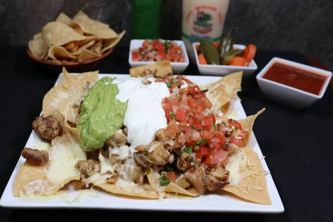 Order Super Nachos food online from Tequila Taqueria store, Livermore on bringmethat.com