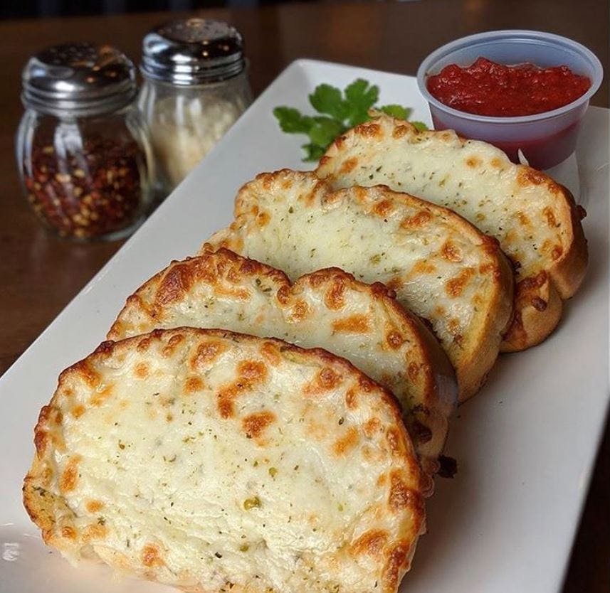 Order Cheese Garlic Toast - 1 Piece food online from Parkway Pizza NE store, Minneapolis on bringmethat.com