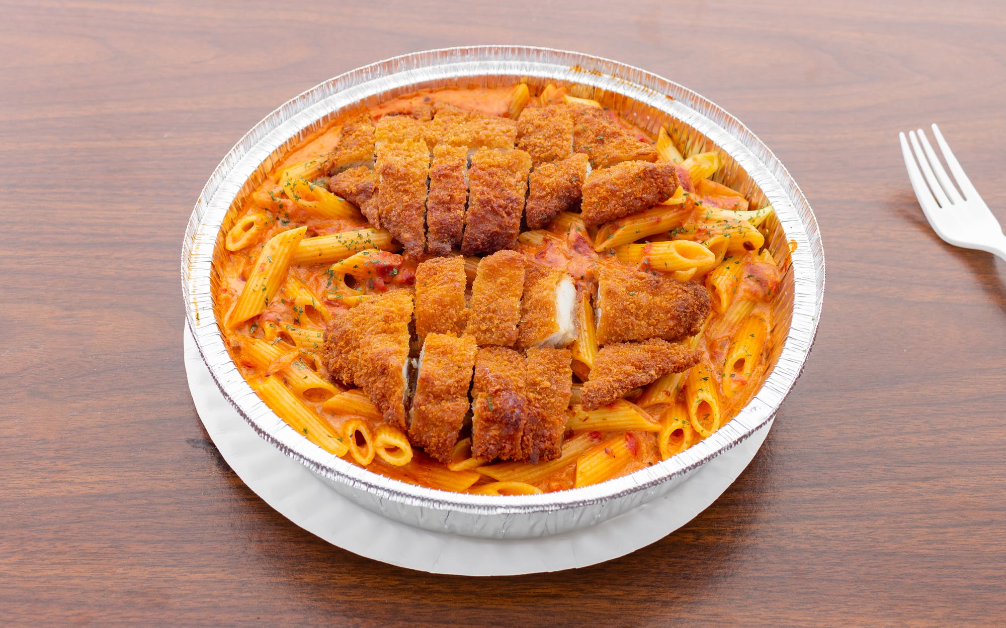 Order Penne Pink Vodka Sauce with Chicken food online from Donna Pizza store, Palisades Park on bringmethat.com