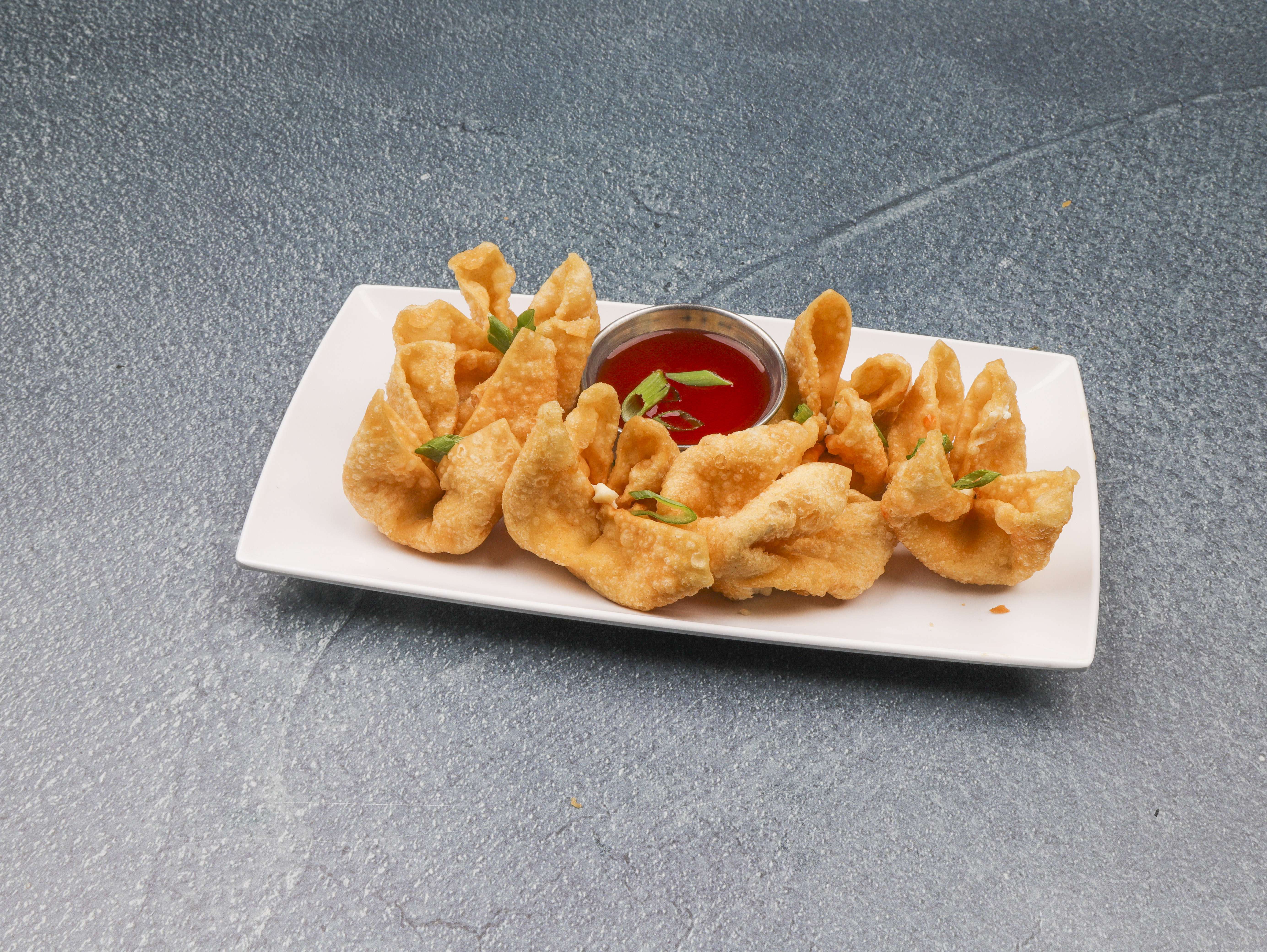 Order 6 Piece Crabmeat Rangoon food online from Canton Express Chinese Restaurant store, Indianapolis on bringmethat.com