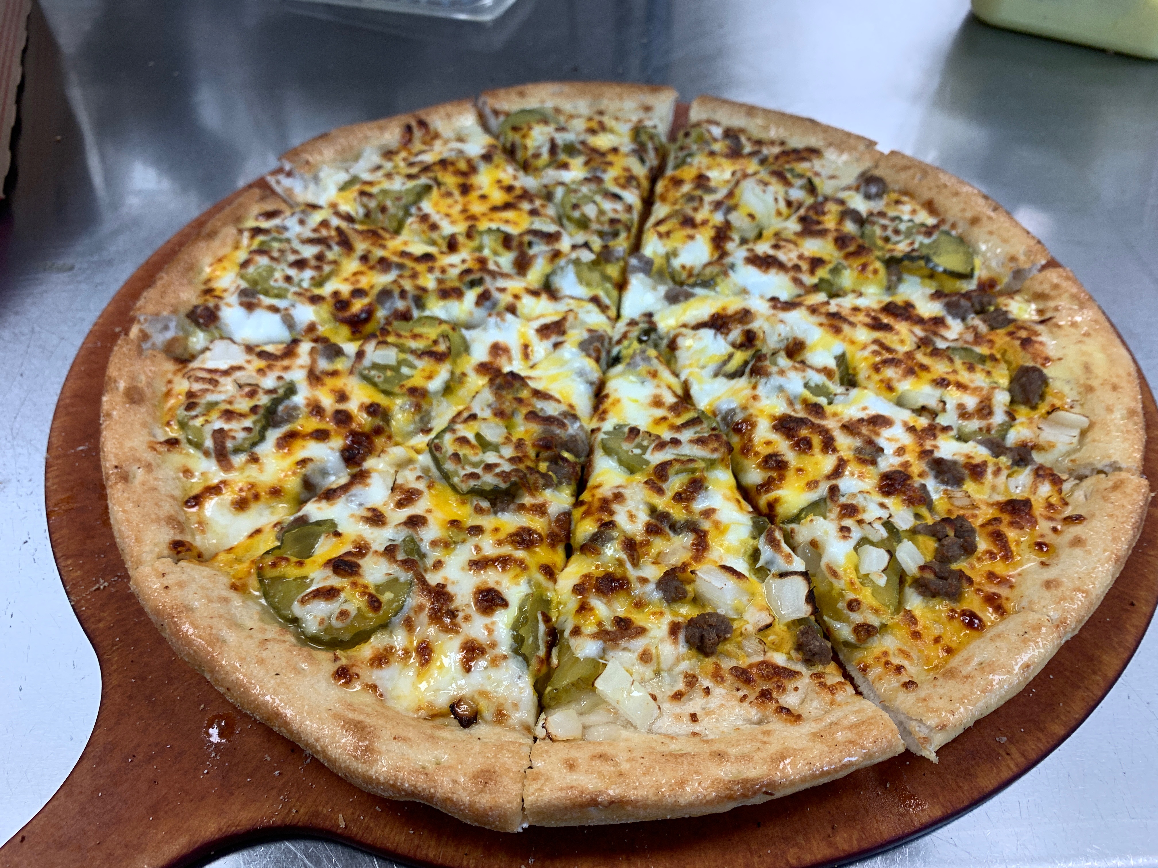 Order Cheeseburger Pizza food online from Cheezie Pizza store, Wichita on bringmethat.com