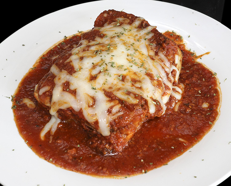 Order Homemade Lasagna food online from Livonia Town Grill store, Livonia on bringmethat.com