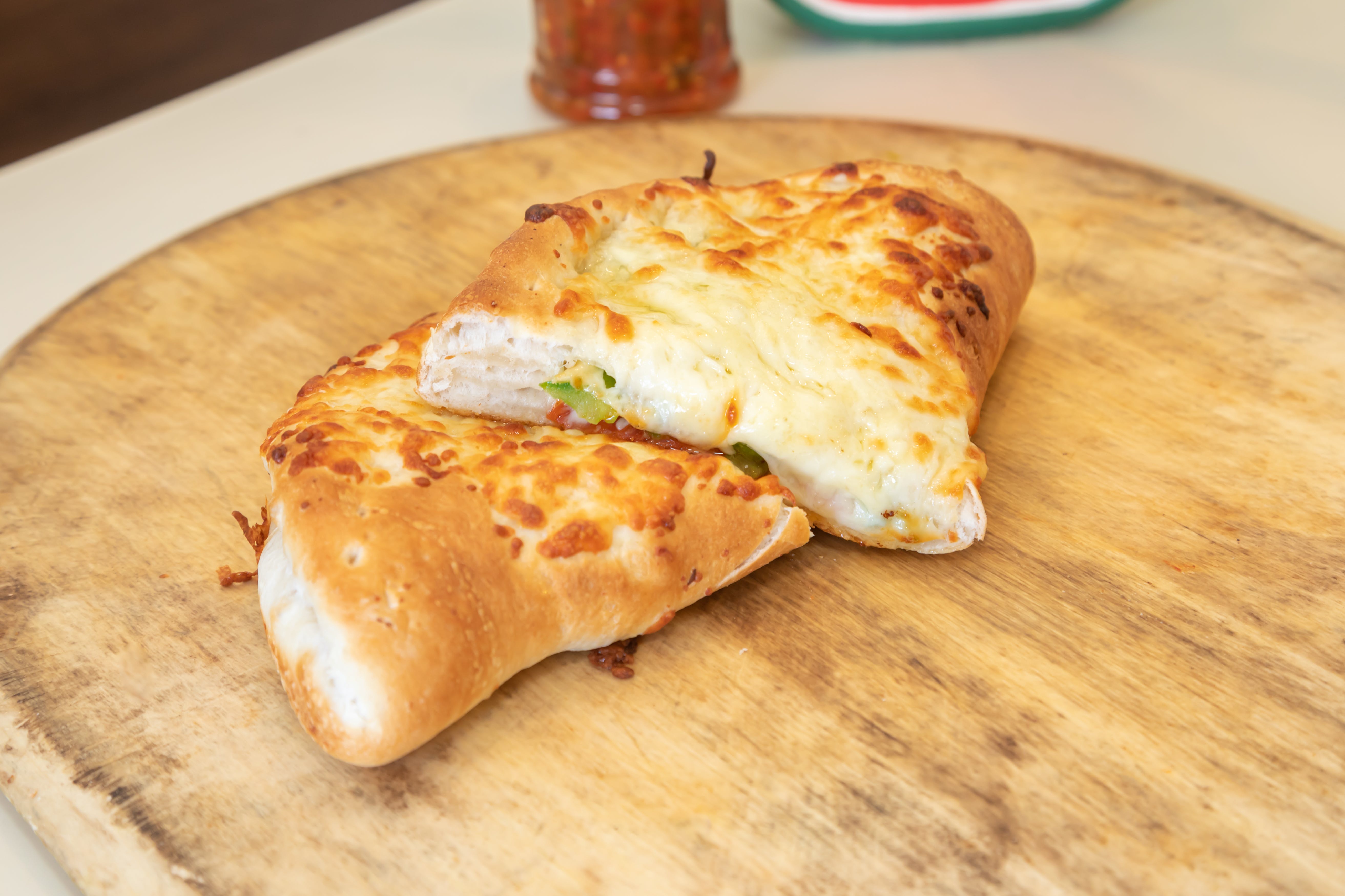 Order Cheese Calzone - Small food online from West Broadway Pizza & Seafood store, Gardner on bringmethat.com