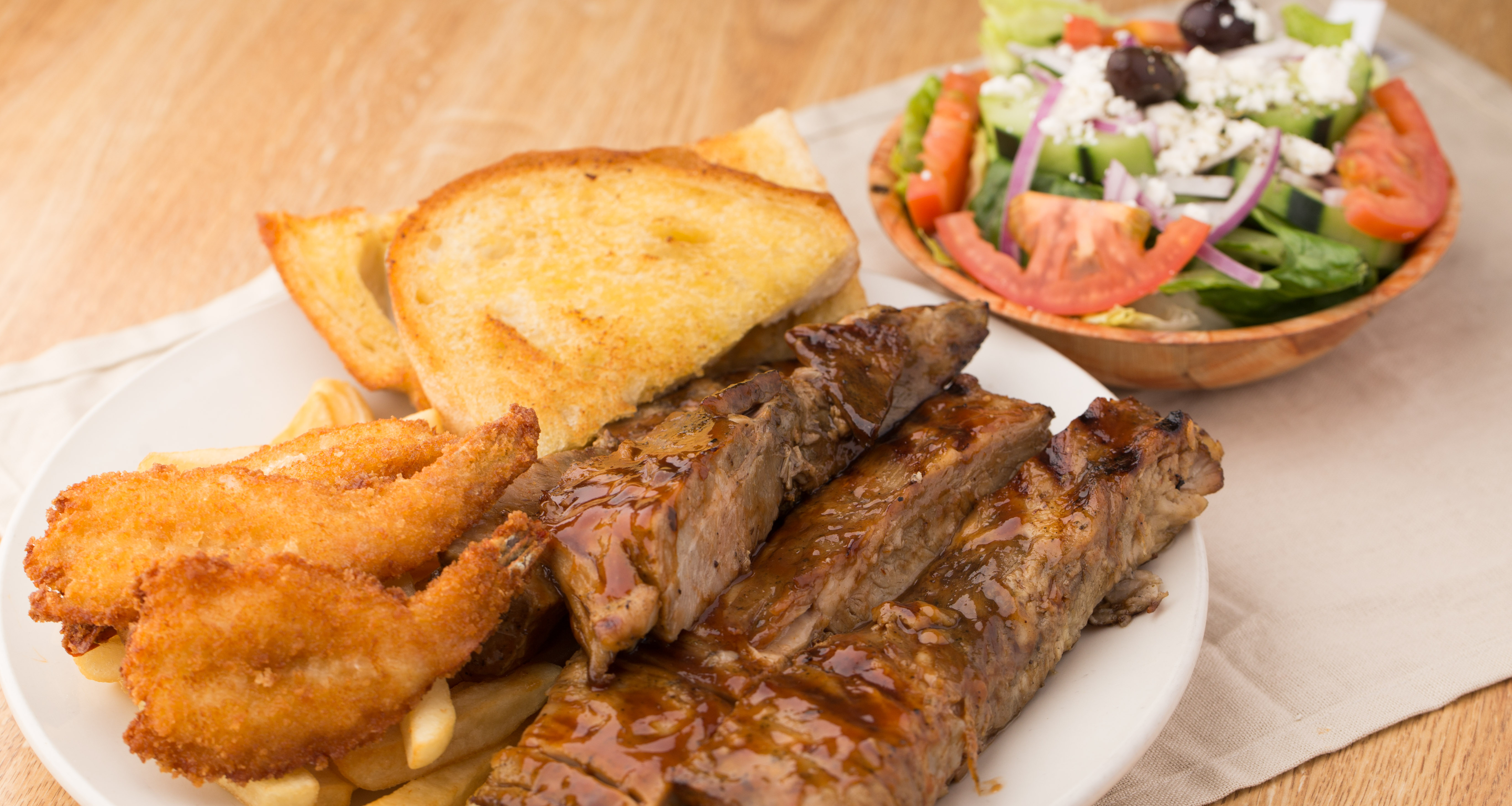 Order Pork Ribs and Shrimp Combo food online from Elsa's Kitchen store, San Diego on bringmethat.com