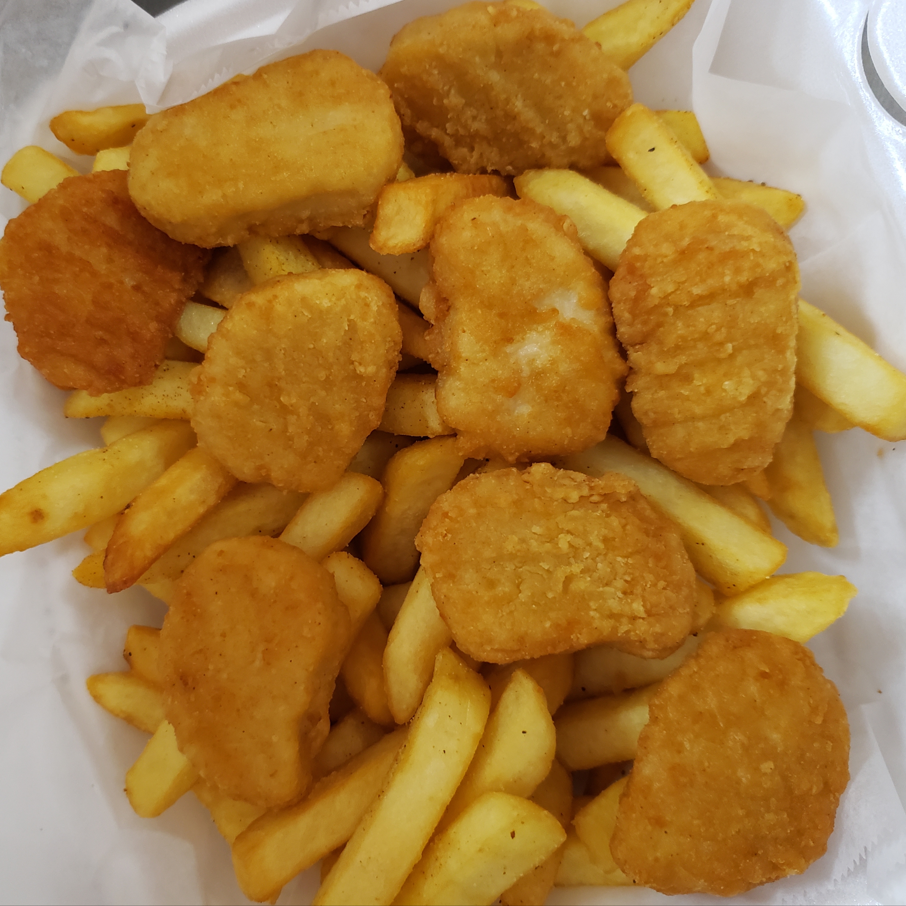 Order  Chicken Nuggets food online from Pizza Mart store, Baltimore on bringmethat.com