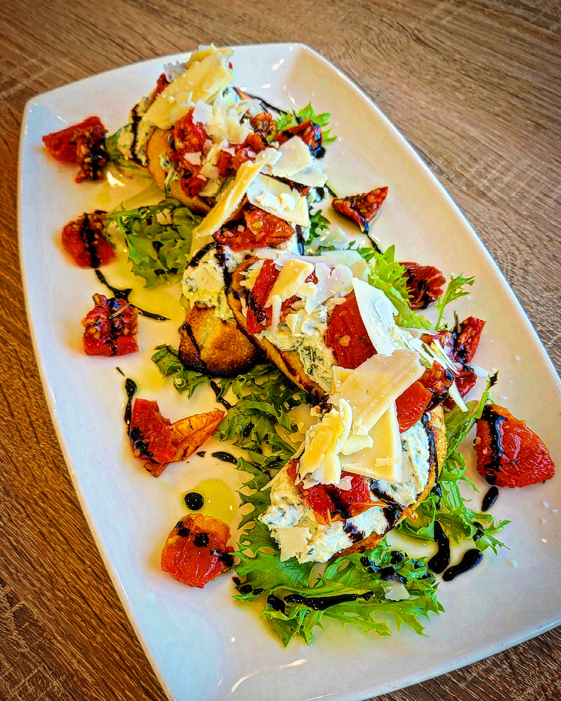 Order Lemon Ricotta Crostini food online from Grill & Tap Room at Shadow Lake store, Penfield on bringmethat.com
