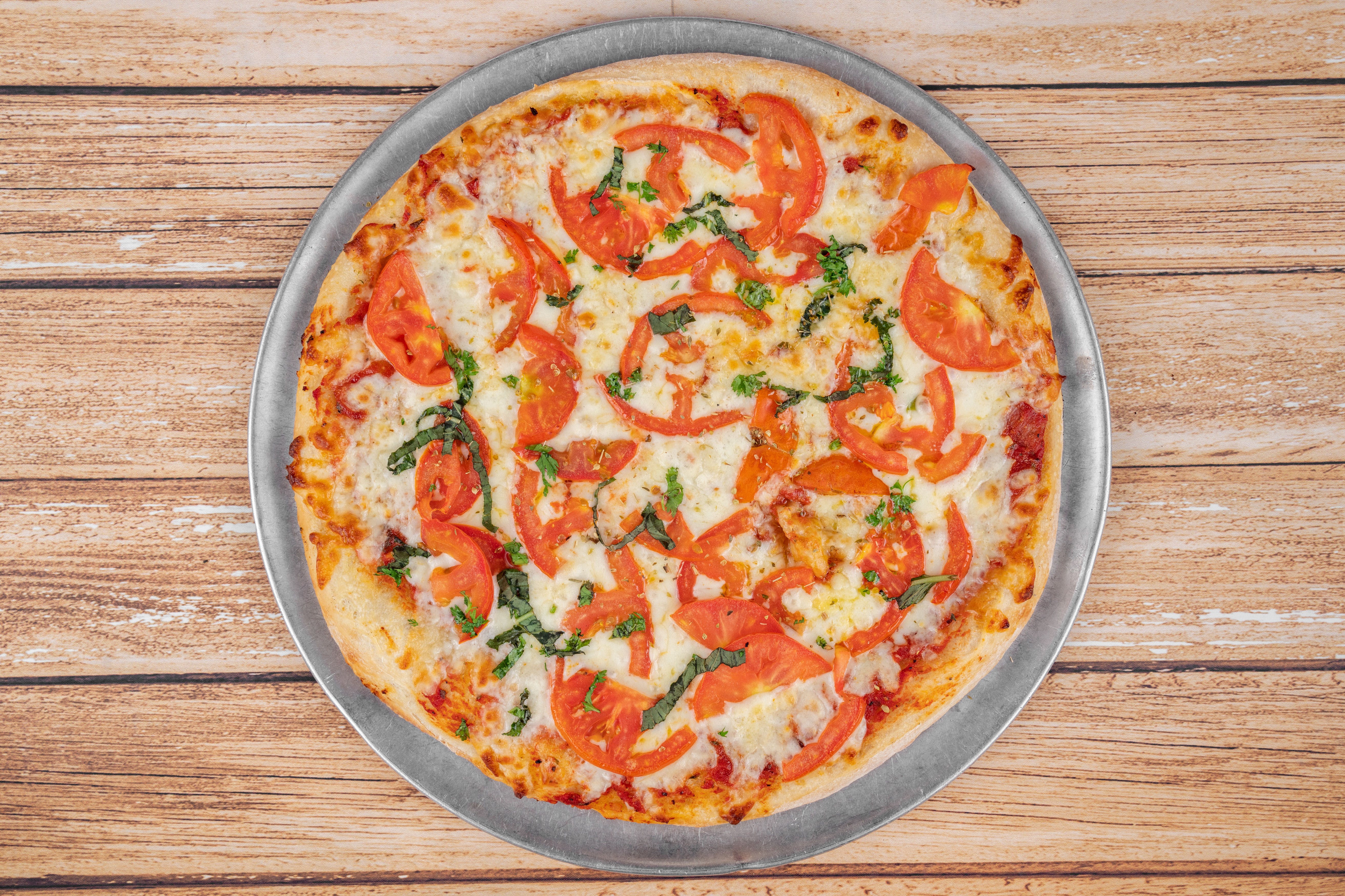 Order Margherita Pizza - Medium 12'' (Serves 1-2) food online from Two Guys Pizzeria store, Houston on bringmethat.com