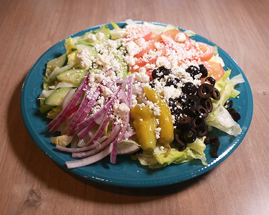 Order Greek Salad food online from Niki Pizza store, Round Rock on bringmethat.com