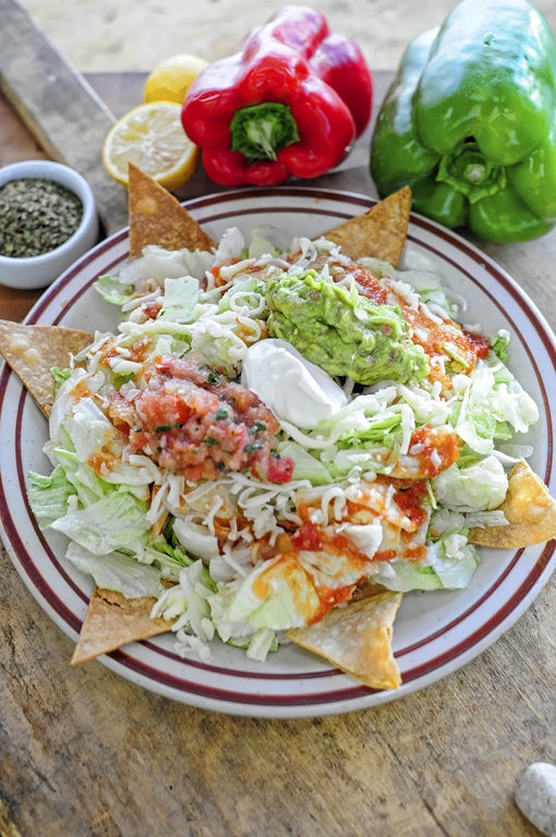 Order Tostada Salad food online from Pizza World store, Los Angeles on bringmethat.com