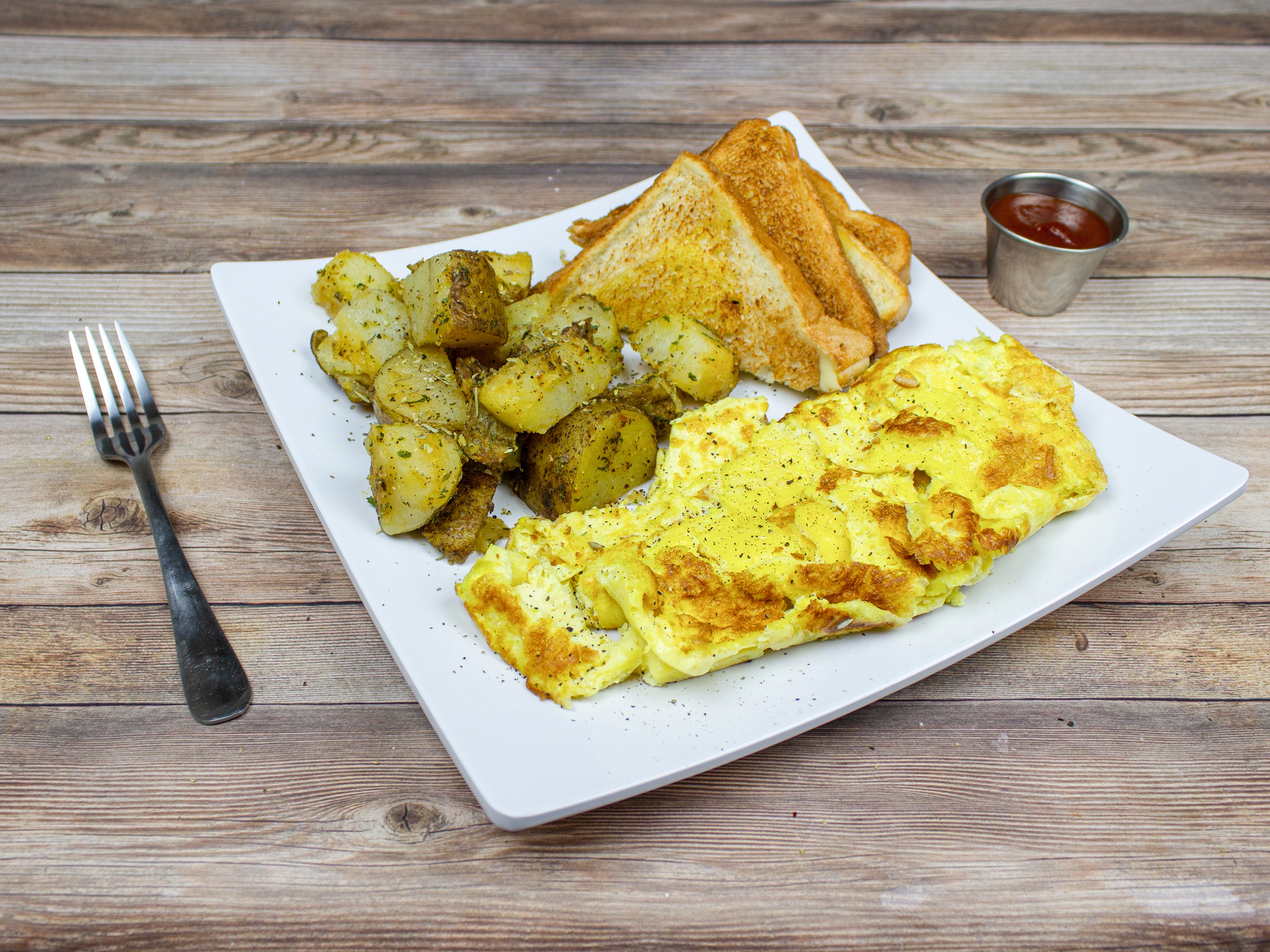 Order Three Eggs with Home Fries and toast food online from Laz Cafe store, Boston on bringmethat.com