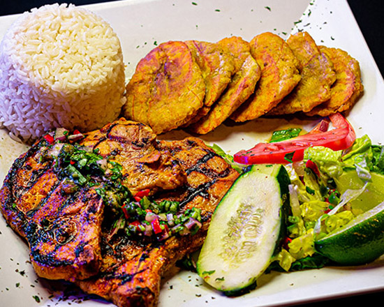 Order Chuleta Frita food online from Versace Dominican Restaurant store, Lilburn on bringmethat.com