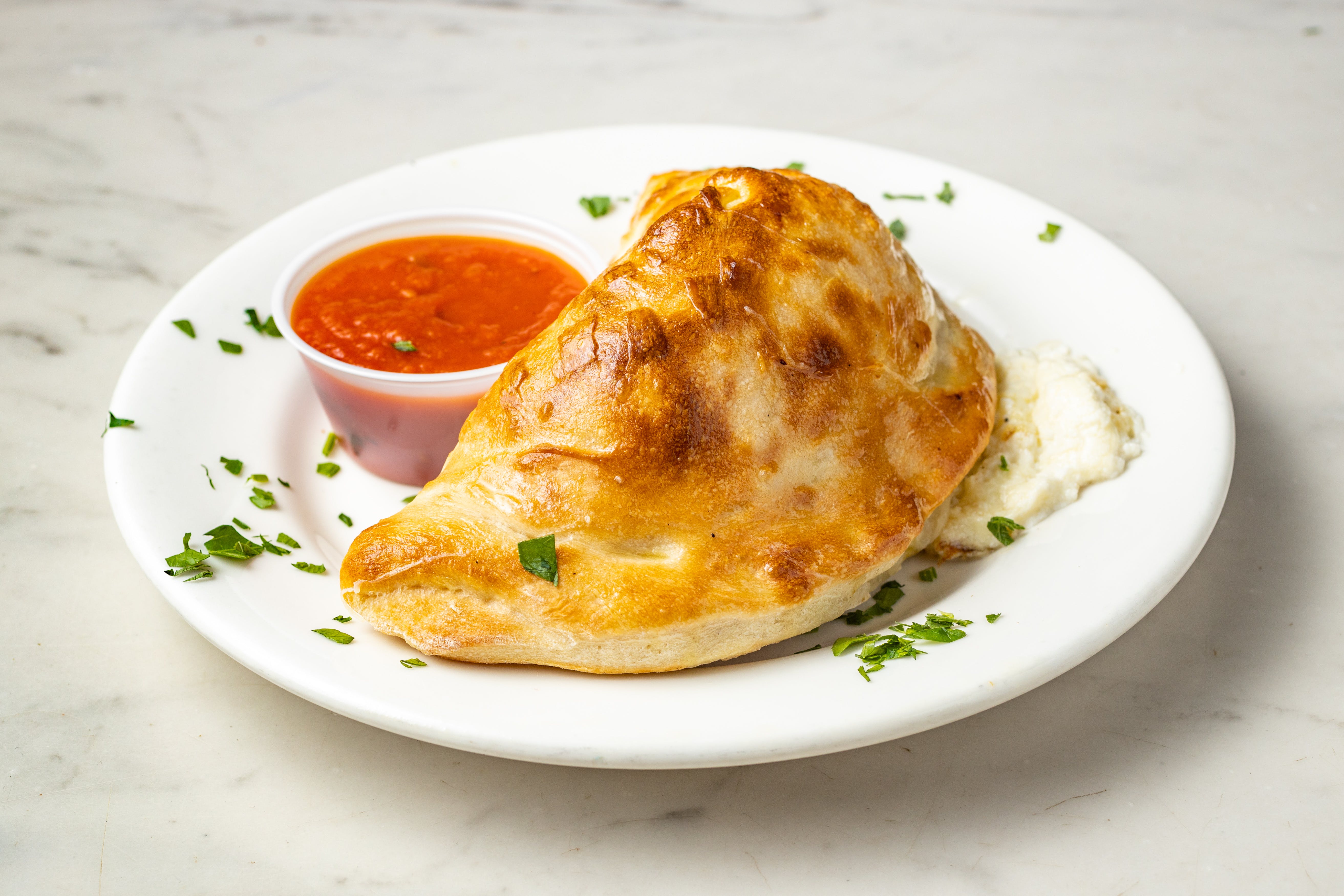 Order Cheese Calzone - Calzone food online from Graziella Pizza store, Flushing on bringmethat.com