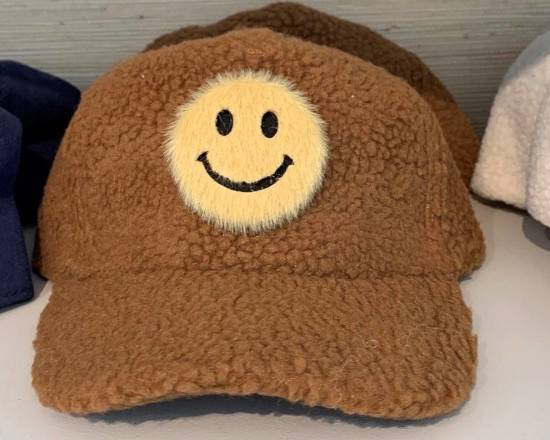 Order Happy Face Sherpa Hat (Brown) food online from Out Of Office at MESH space store, Redondo Beach on bringmethat.com
