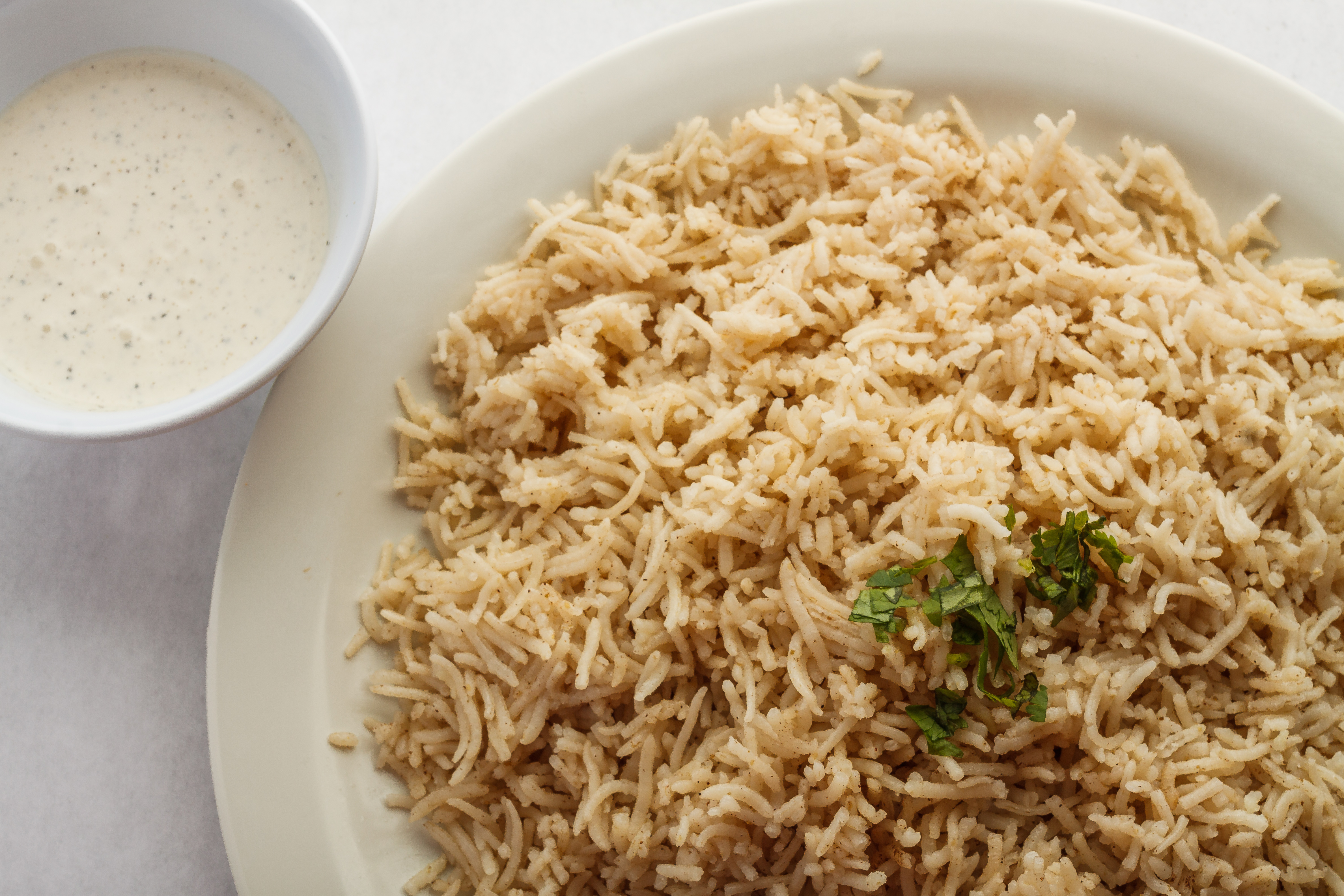 Order Plain Rice food online from Raja Curry Kitchen & Grill store, Lake Charles on bringmethat.com