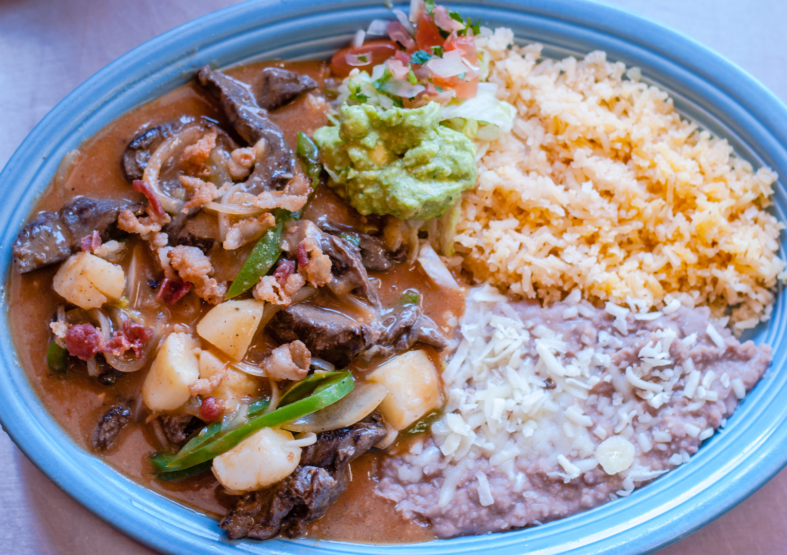Order Steak Rancheros food online from Chabelo Mexican Grill store, Castaic on bringmethat.com