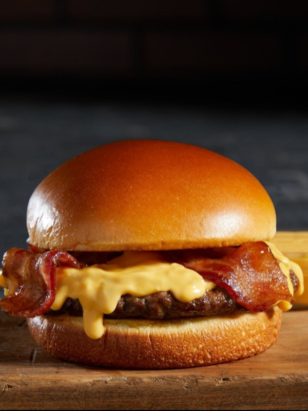 Order Bacon Cheddar Cheesy Burger food online from Nathan Famous store, Atlanta on bringmethat.com