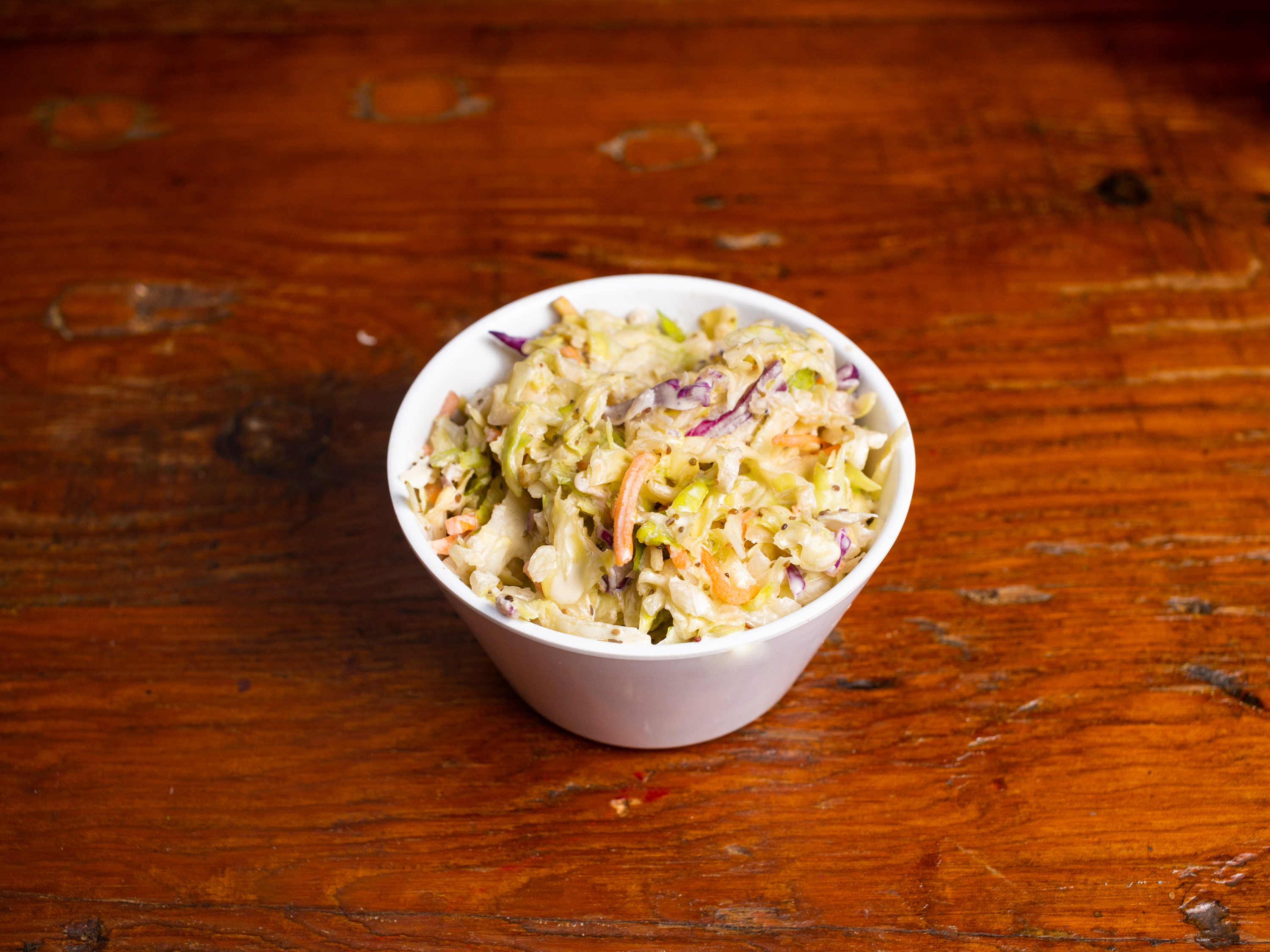 Order Coleslaw food online from Baby Blues Bbq store, San Francisco on bringmethat.com