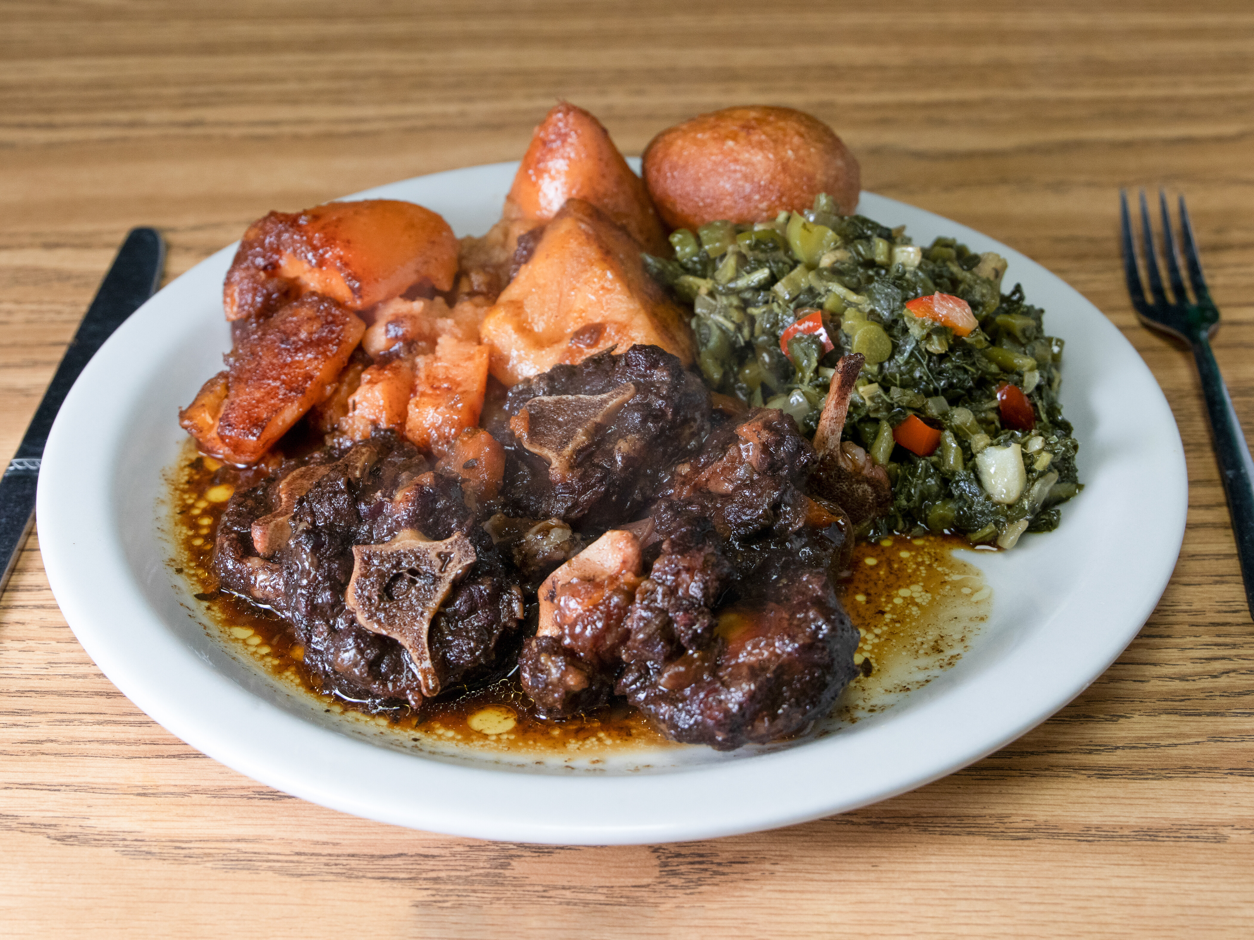 Order Oxtail Tuesday Special food online from Jamaican & African Cuisine store, Jackson on bringmethat.com