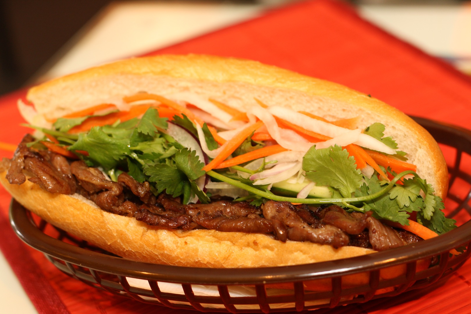Order 14. Vietnamese Style Grilled Pork Sandwich food online from Saigon Noodles & Grill store, Arlington on bringmethat.com