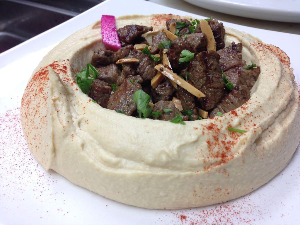 Order Large Hummus With Topping Lamb  food online from Boukie Grill store, Royal Oak on bringmethat.com