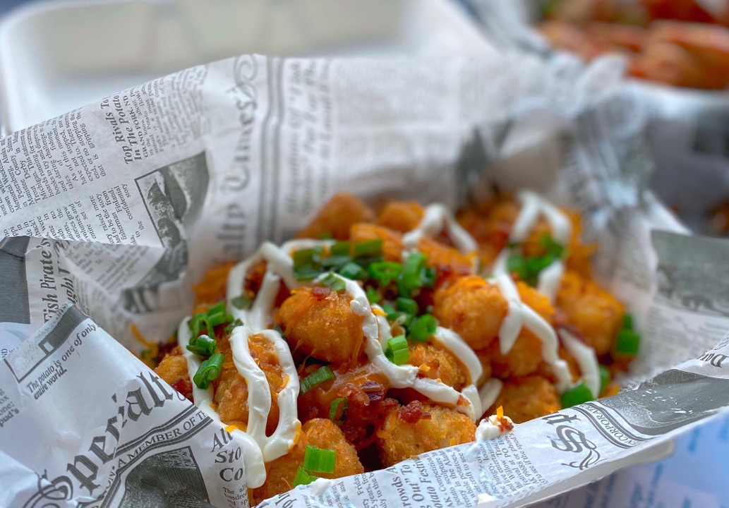 Order Loaded Tots food online from Blue Dog Tavern store, Grand Rapids on bringmethat.com
