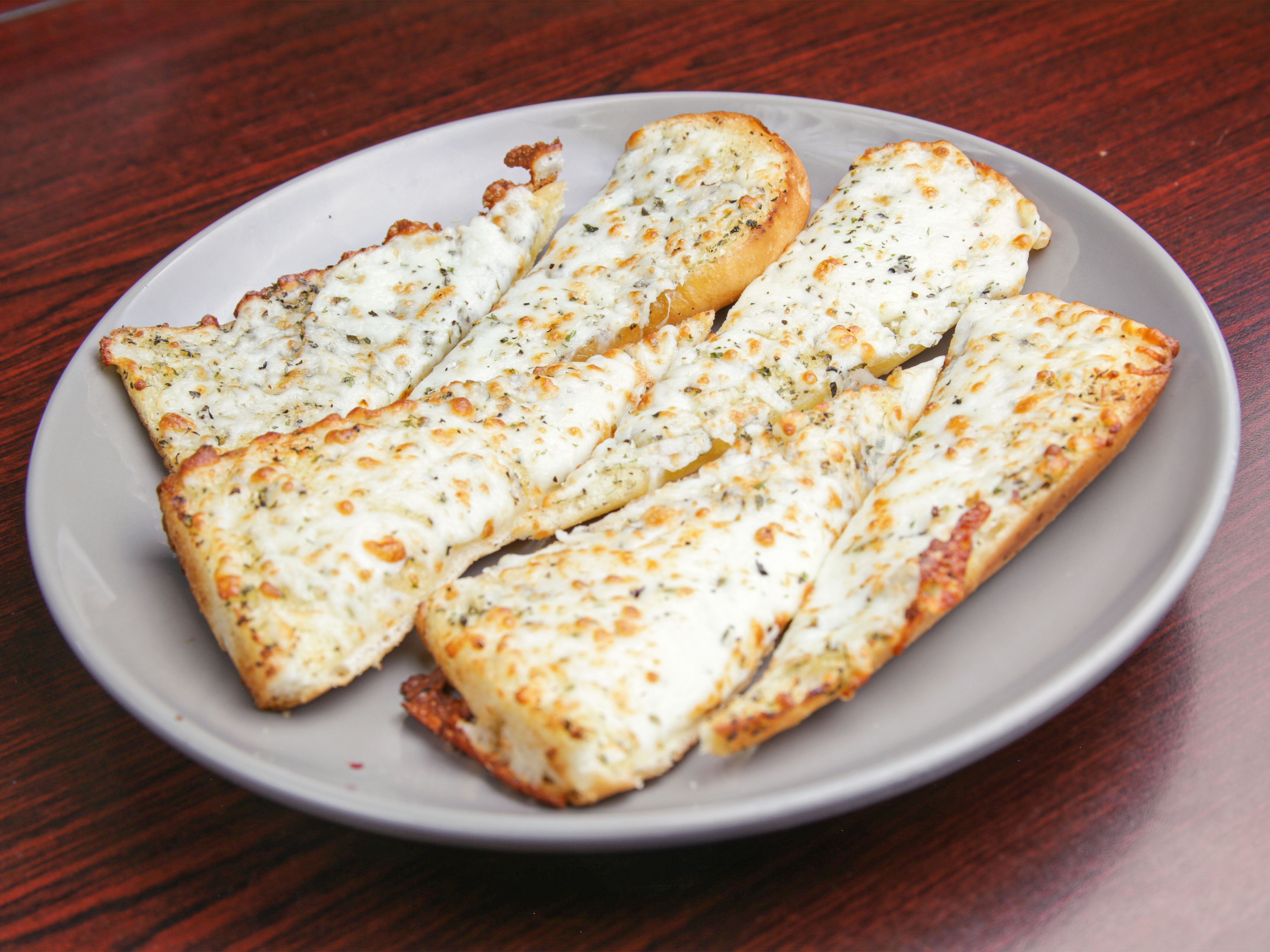 Order Garlic Cheese Bread food online from Rino D's Pizza & Wings store, Gilbert on bringmethat.com