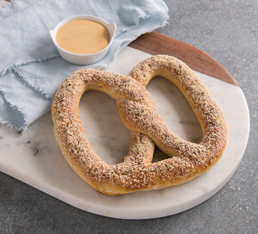 Order Roasted Garlic and Parmesan Pretzel food online from Auntie Anne store, Exton on bringmethat.com