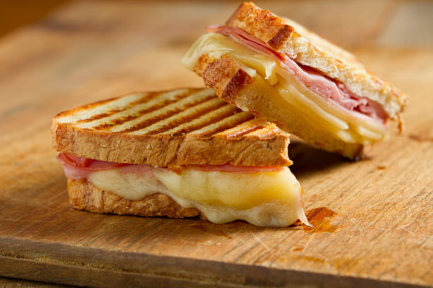 Order Sandwich Bread with Melted Cheese and Ham food online from Cafe Valencia store, San Francisco on bringmethat.com