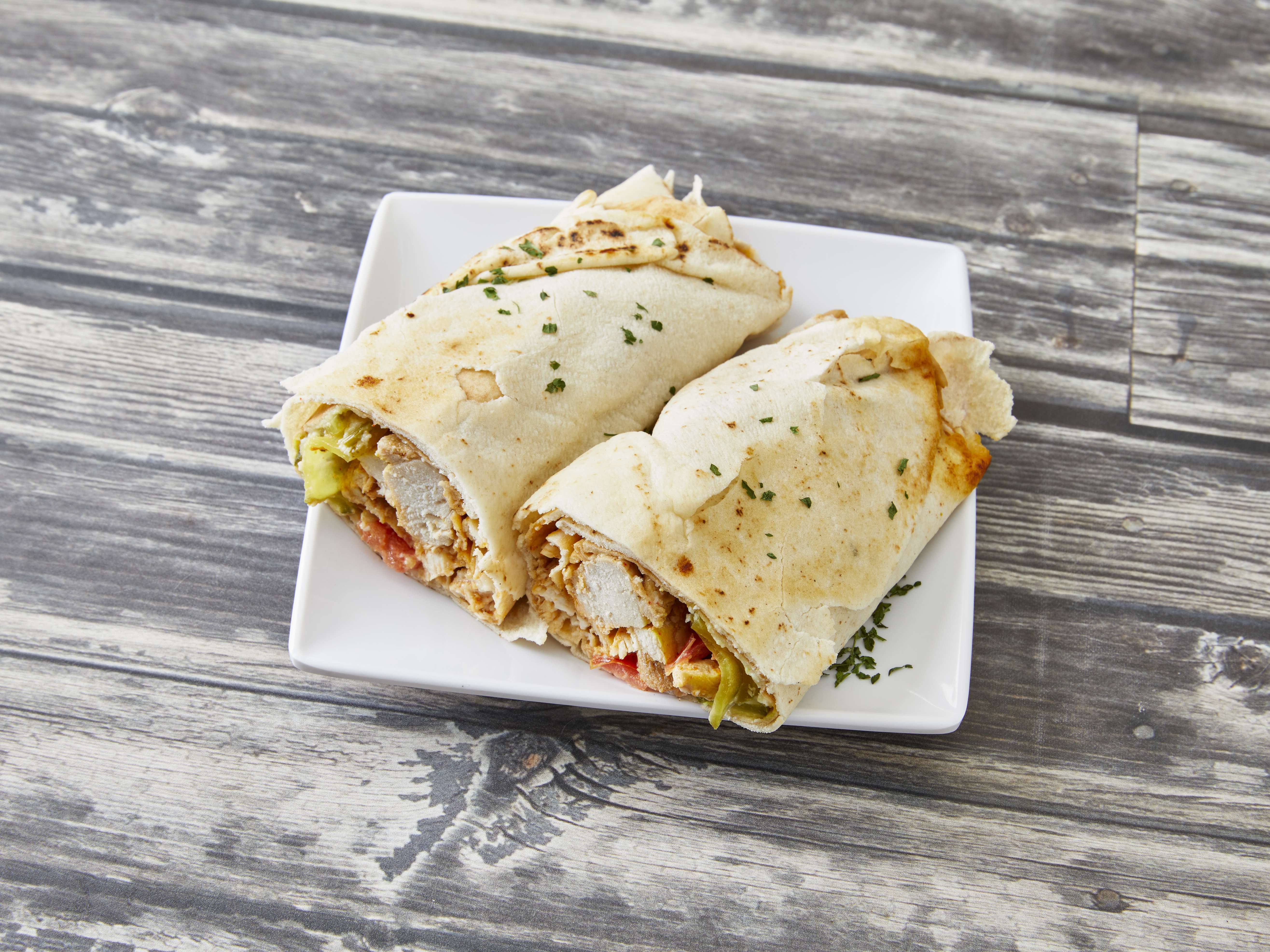 Order Chicken Shawarma Sandwich food online from Manhattan Deli 2 store, Southfield on bringmethat.com