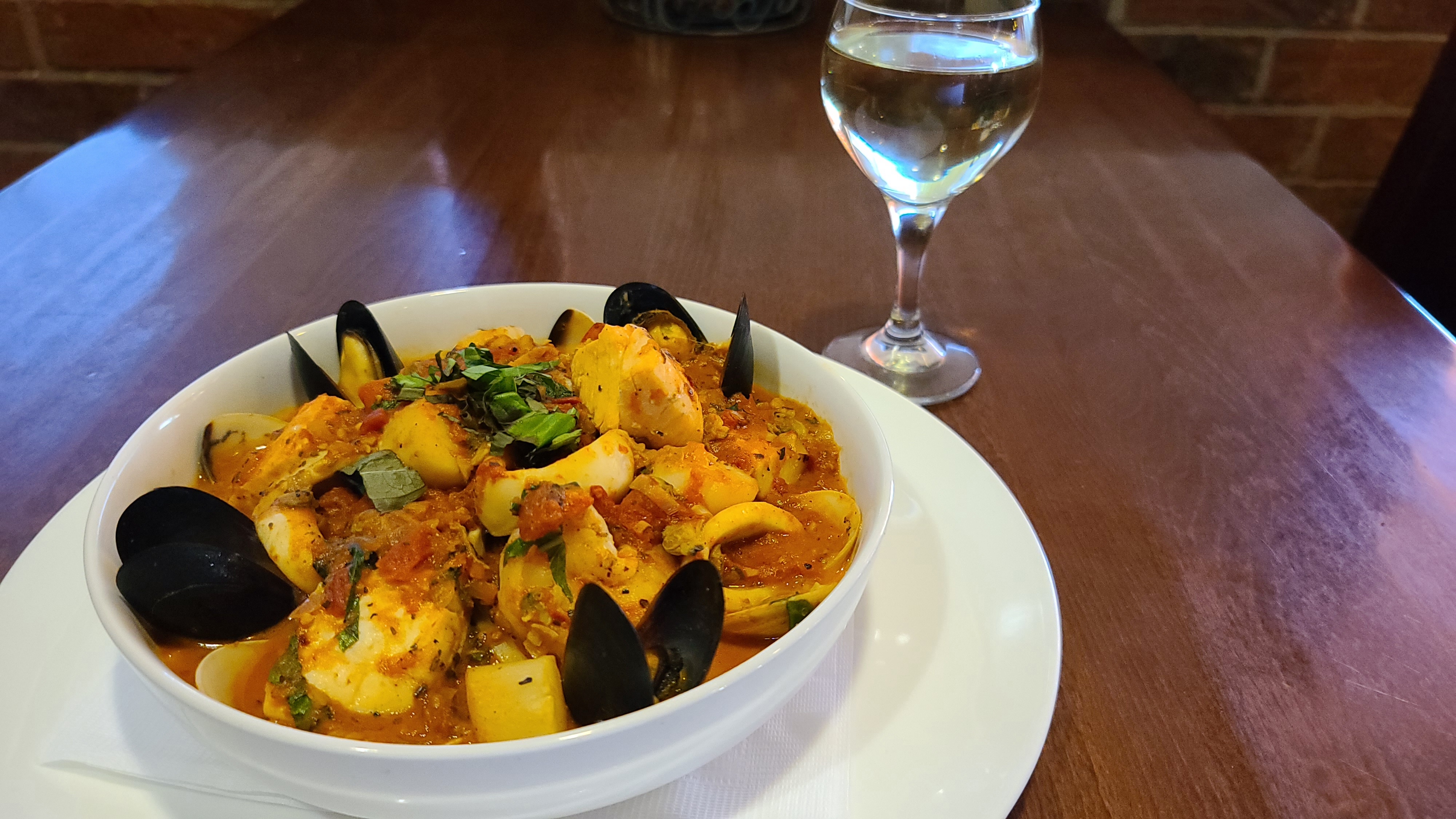Order Cioppino food online from Italian Cafe store, Irving on bringmethat.com