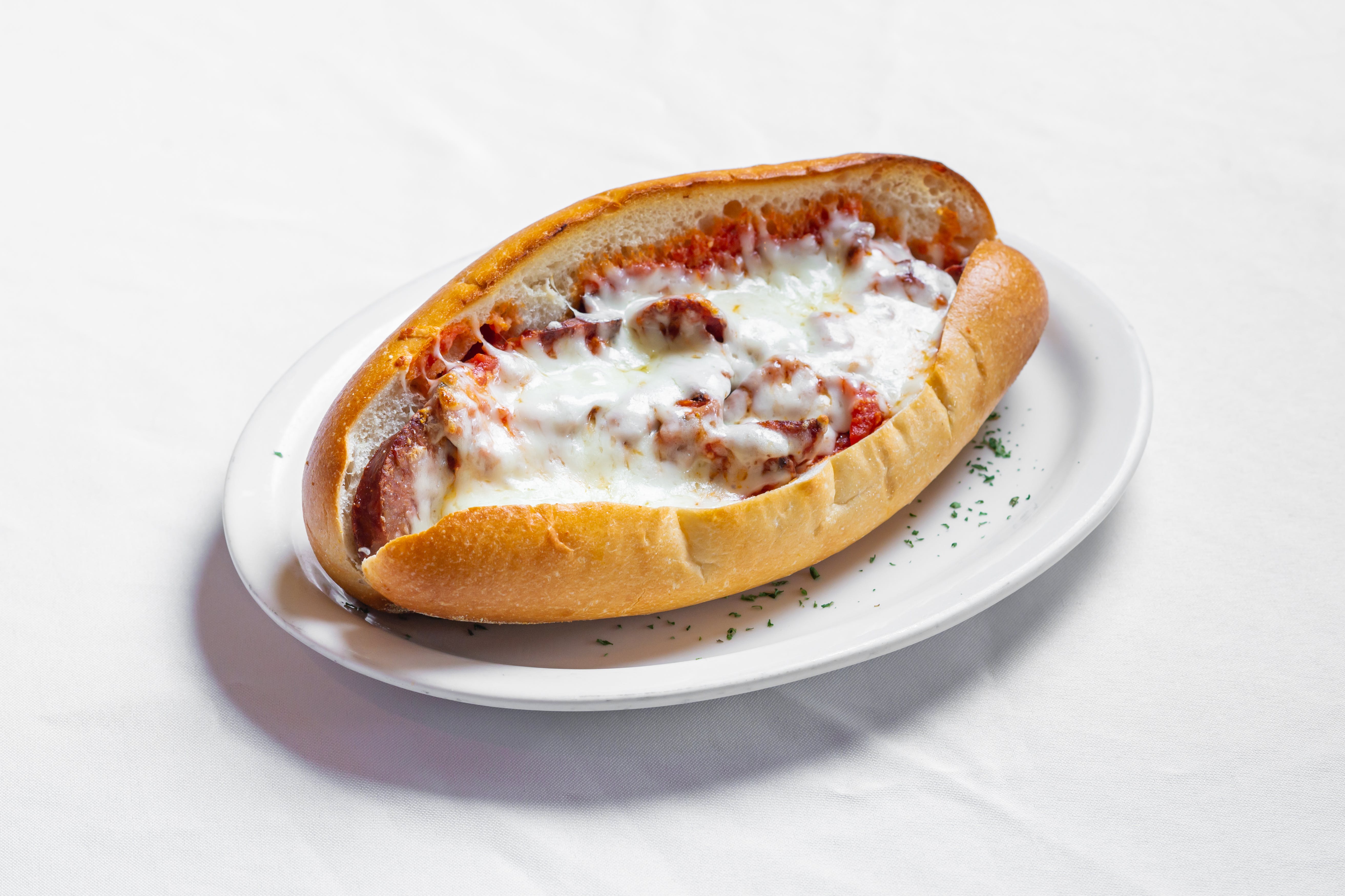 Order Sausage Parmigiana Sub - Sub food online from Uncle Sal Pizza Ii store, Sparta Township on bringmethat.com
