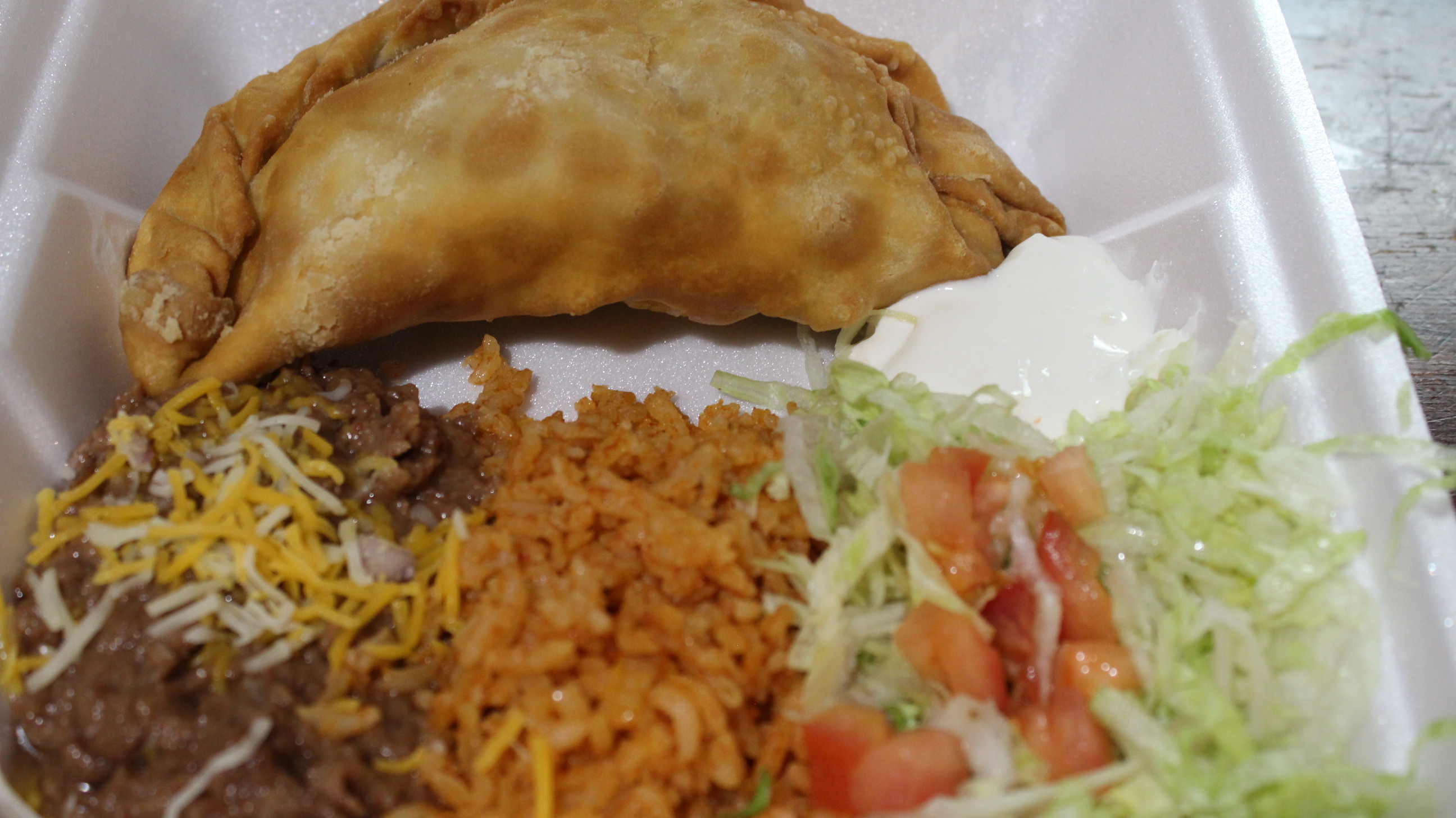 Order #5. Chimichanga Dinner Plate food online from El Tapatio Restaurant store, Muskegon on bringmethat.com