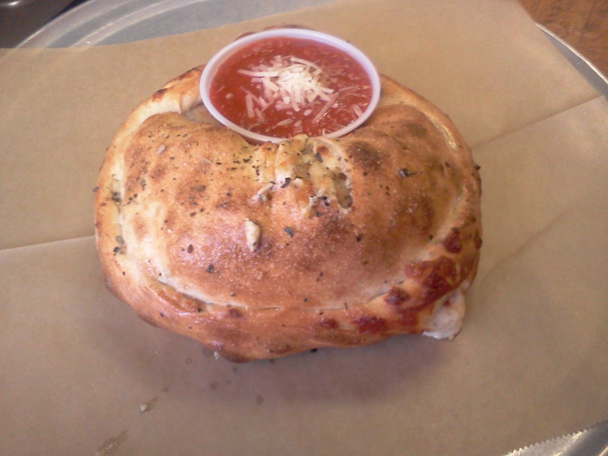 Order Calzone food online from Mojo Pizza & Pub store, Decatur on bringmethat.com